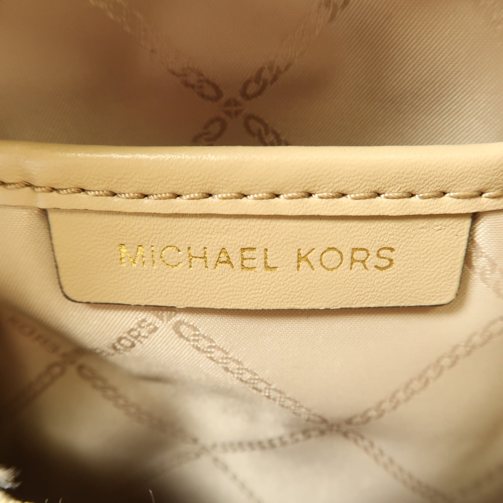 Michael Kors 塗層帆布Backpack金扣背包杏色/淺褐色