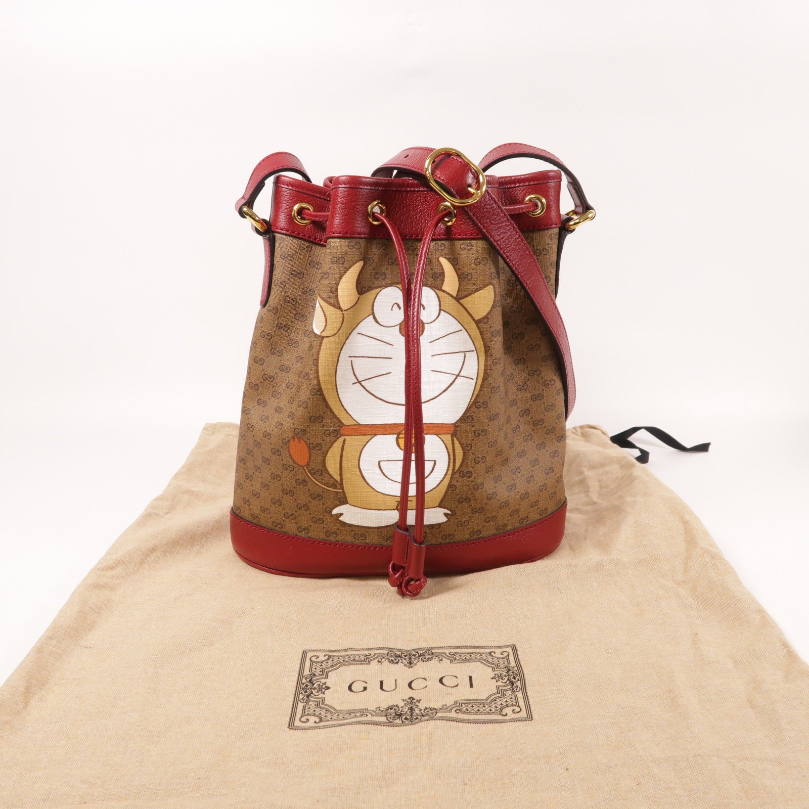 GUCCI 塗層帆布Gucci X Doraemon Bucket Bag金扣肩背袋