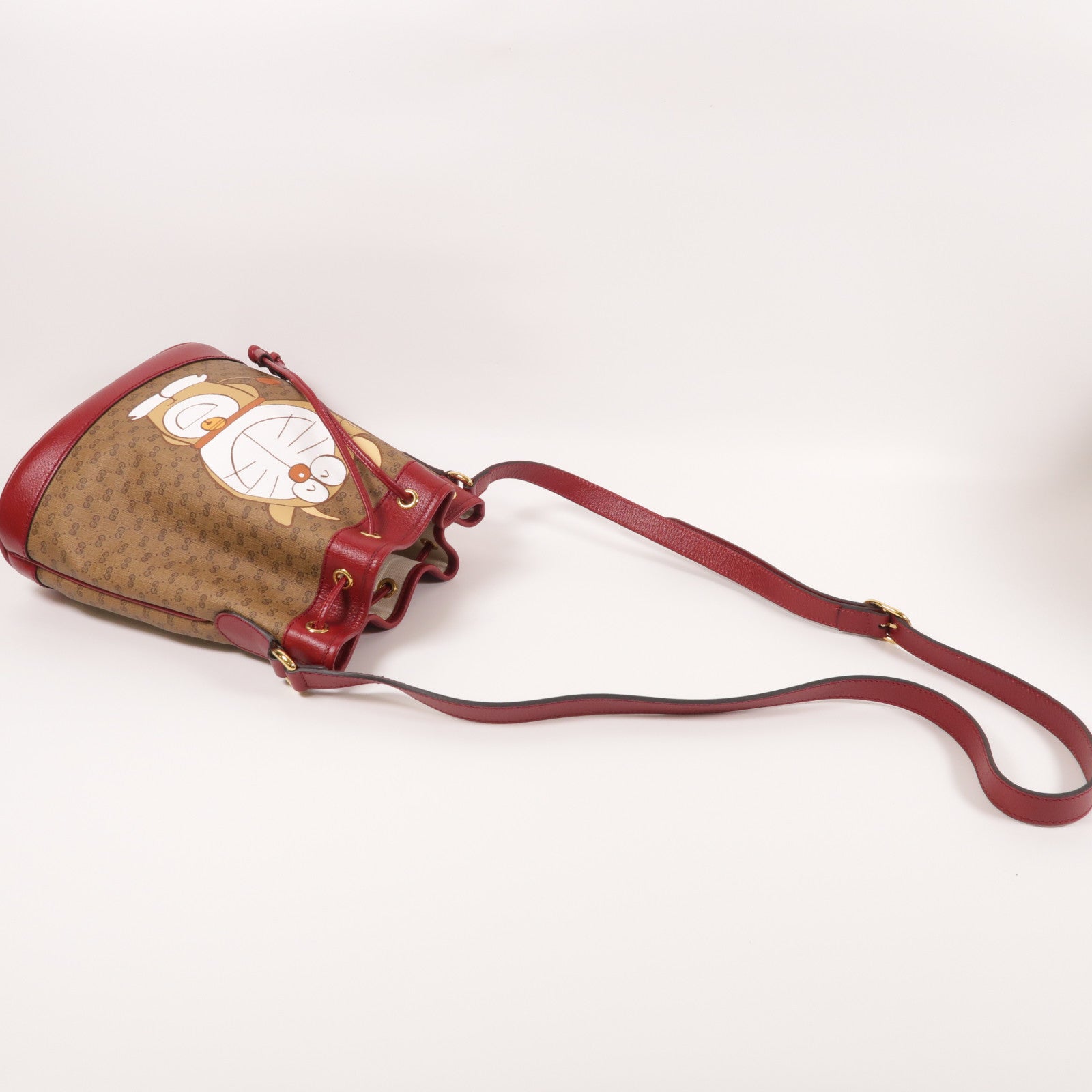 GUCCI 塗層帆布Gucci X Doraemon Bucket Bag金扣肩背袋