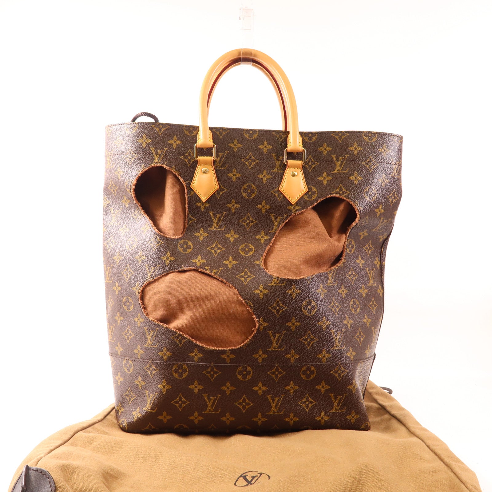 LOUIS VUITTON Monogram Bag With Holes金扣手挽袋