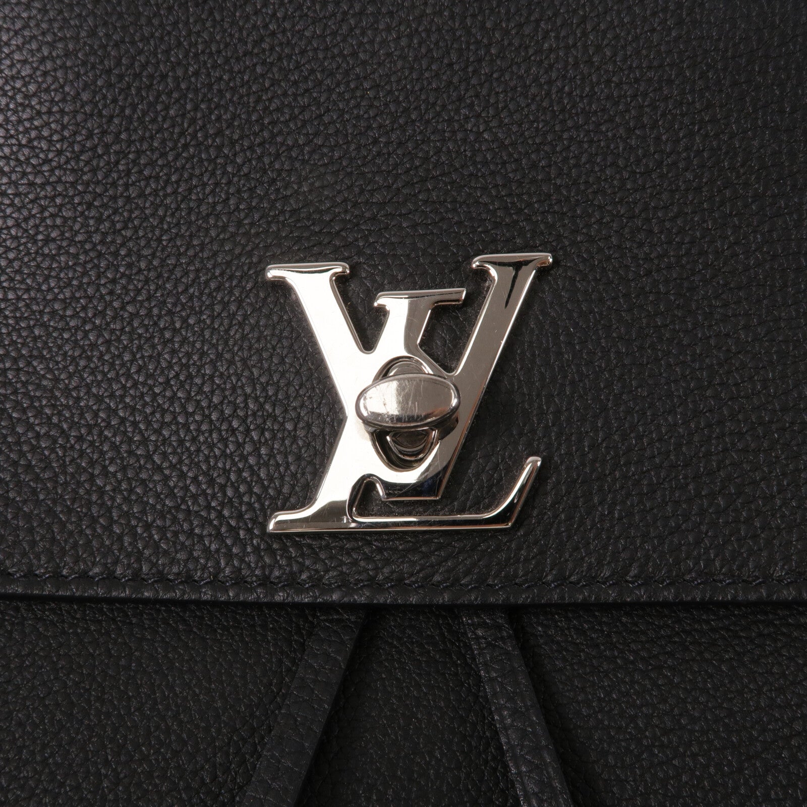 LOUIS VUITTON 牛皮皮革Lock Me Backpack背包