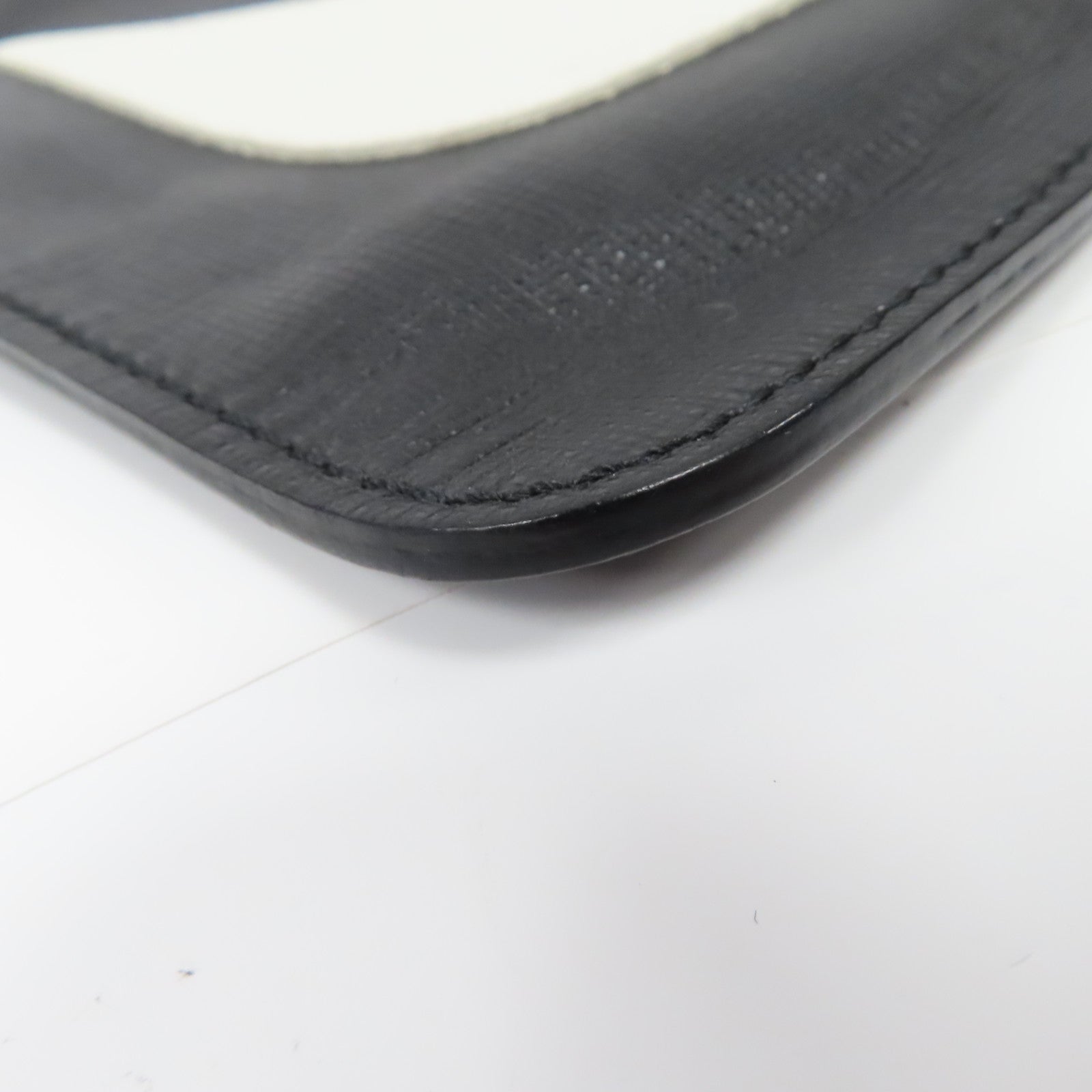 FENDI 牛皮皮革Monster Clutch Bag銀扣手拿包黑色