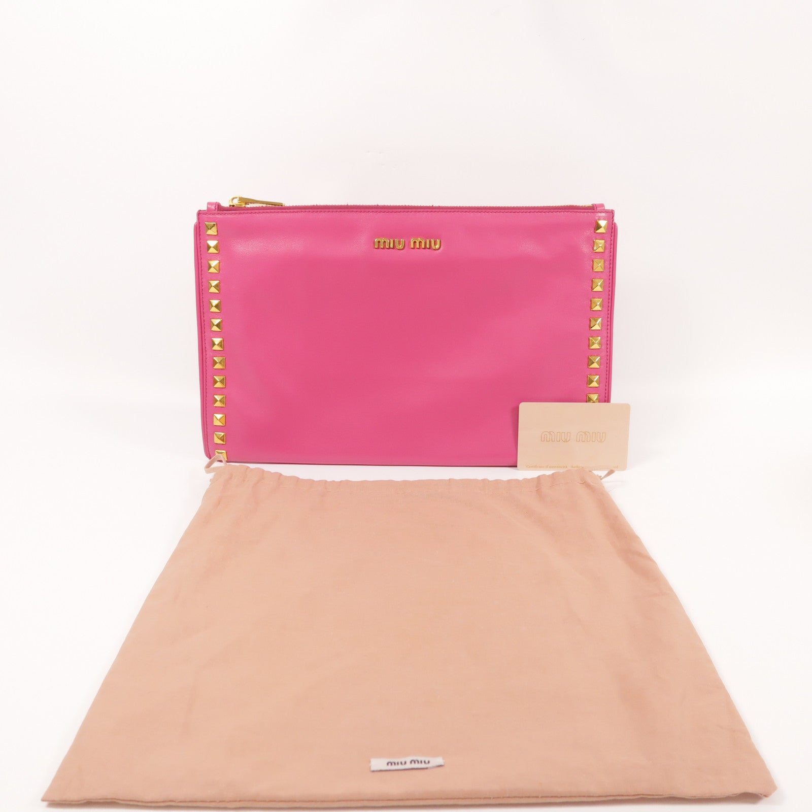 Miu Miu 牛皮皮革Clutch Bag金扣手拿包