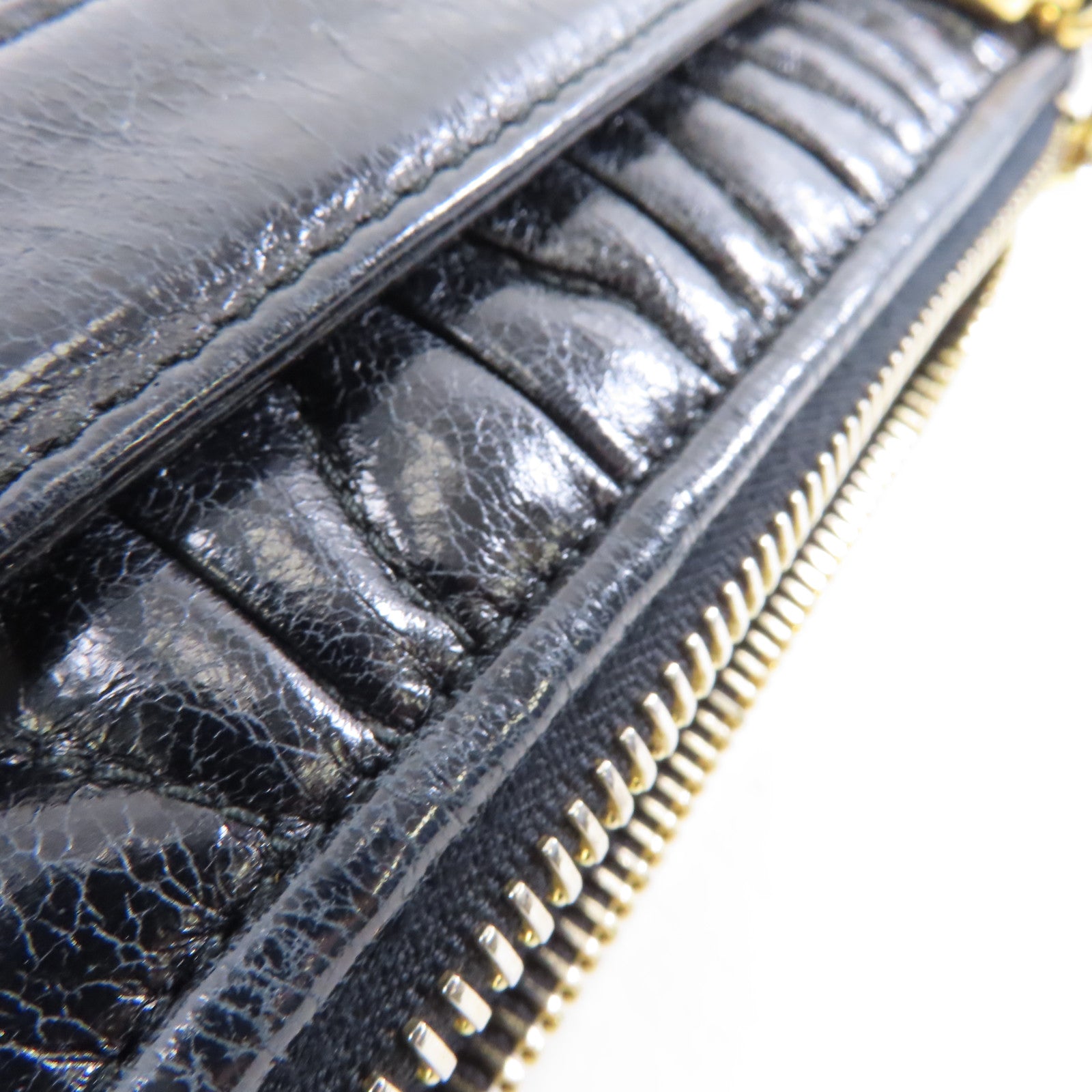 Miu Miu 牛皮皮革Clutch Bag金扣手拿包黑色