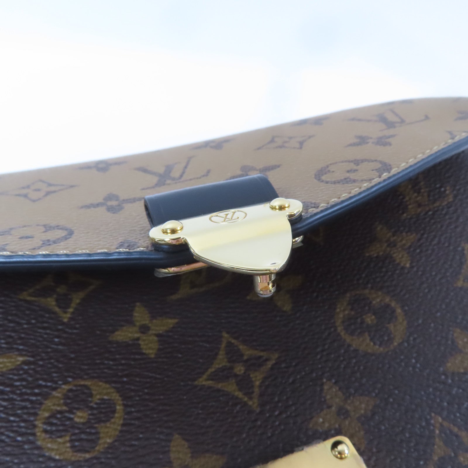 LOUIS VUITTON Monogram Reverse Pochette Métis金扣手挽肩背兩用袋啡色