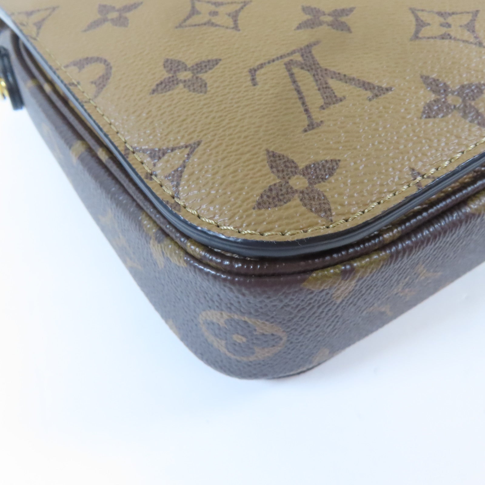 LOUIS VUITTON Monogram Reverse Pochette Métis金扣手挽肩背兩用袋啡色