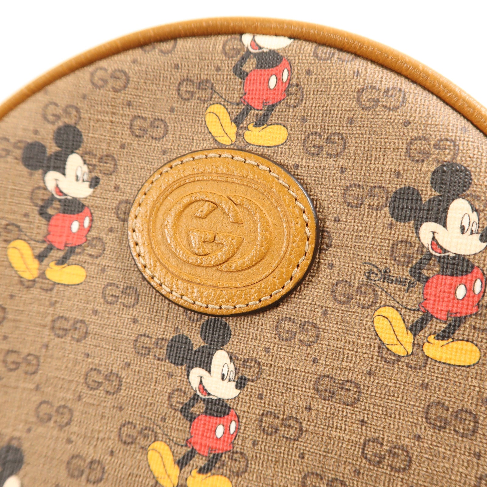 GUCCI 塗層帆布Disney GG Backpack金扣鏈帶背包
