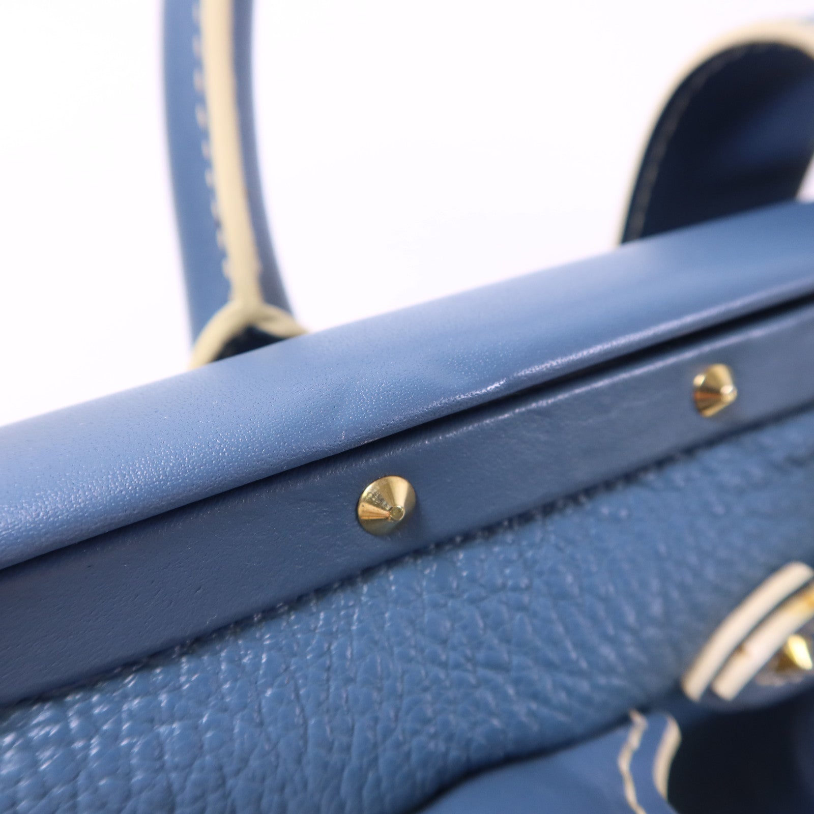 LOUIS VUITTON Suhali Angenieux PM金扣手挽袋