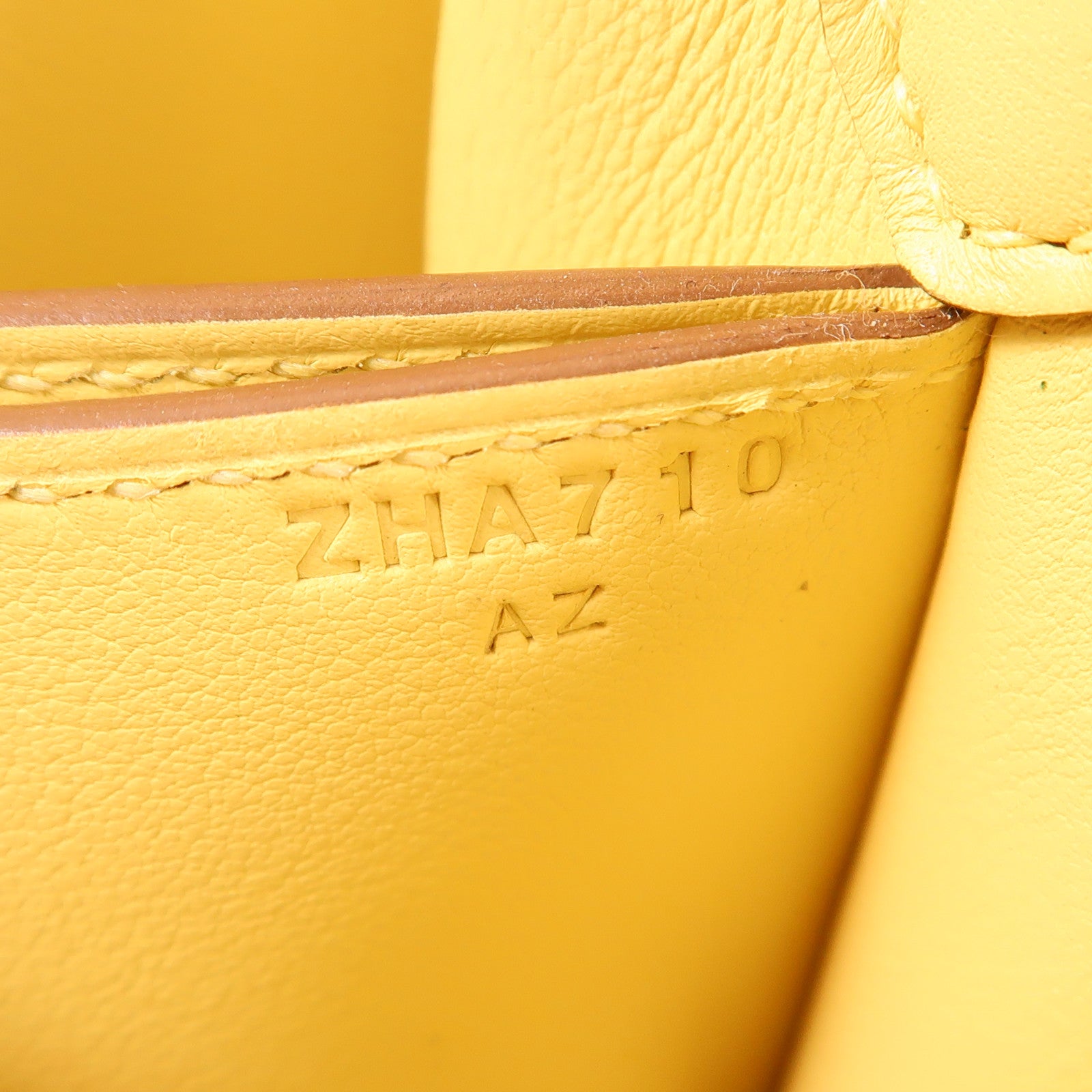 HERMES Swift皮革Mini Roulis金扣手挽袋Yellow