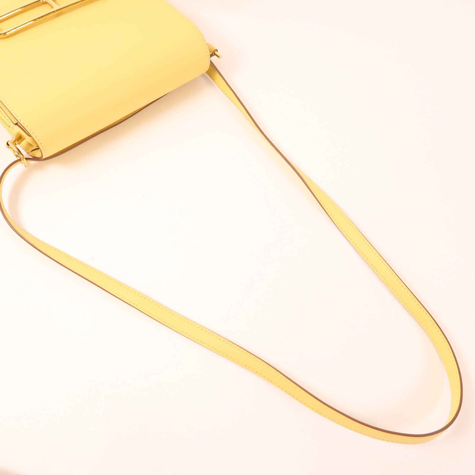 HERMES Swift皮革Mini Roulis金扣手挽袋Yellow