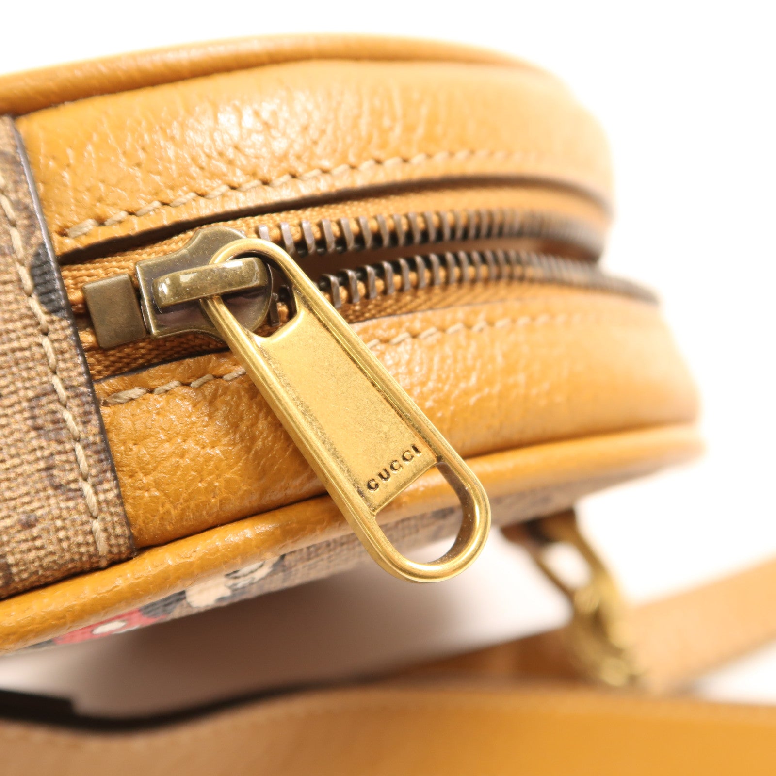 GUCCI 塗層帆布Disney GG Backpack金扣鏈帶背包