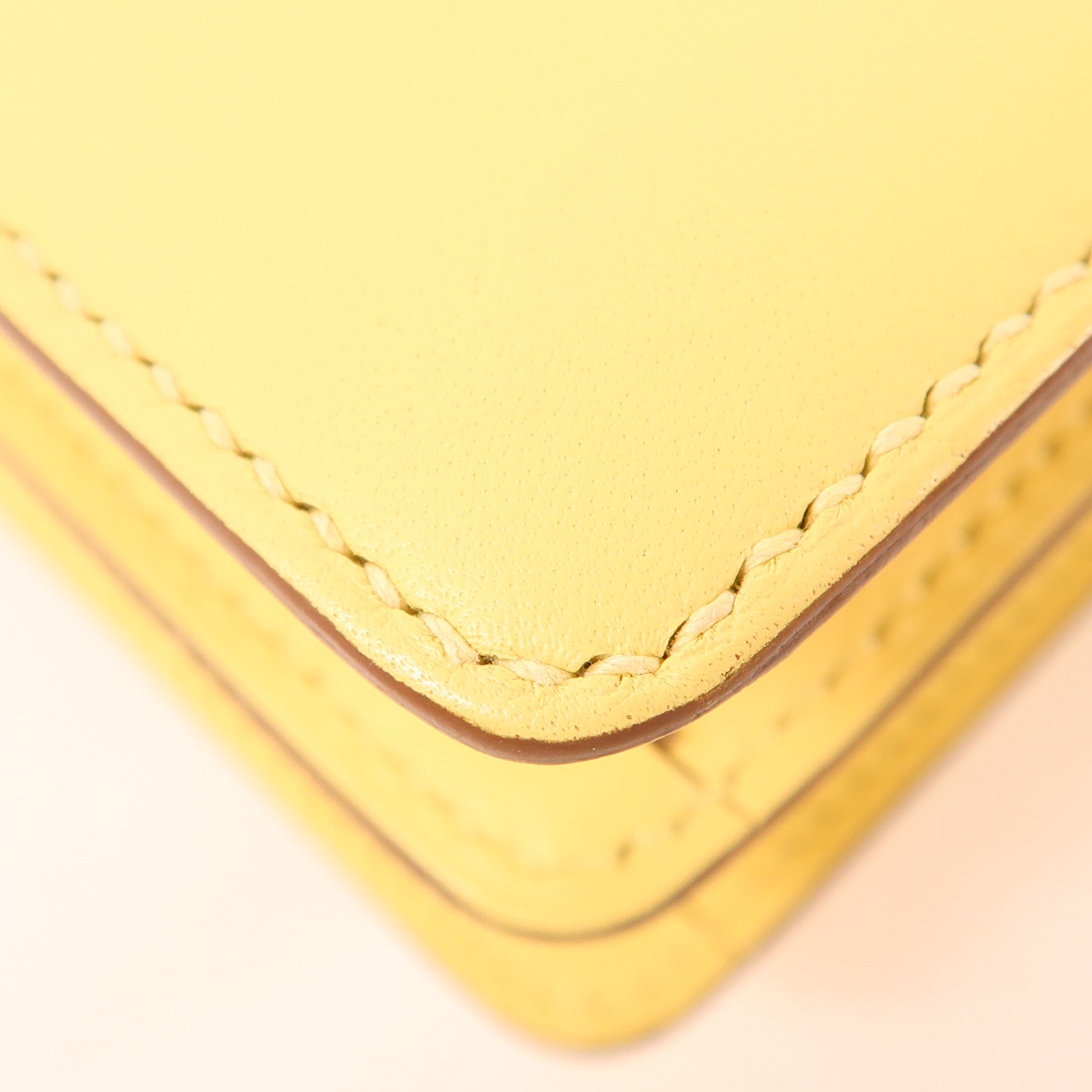 HERMES Swift皮革Mini Roulis金扣手挽袋Yellow