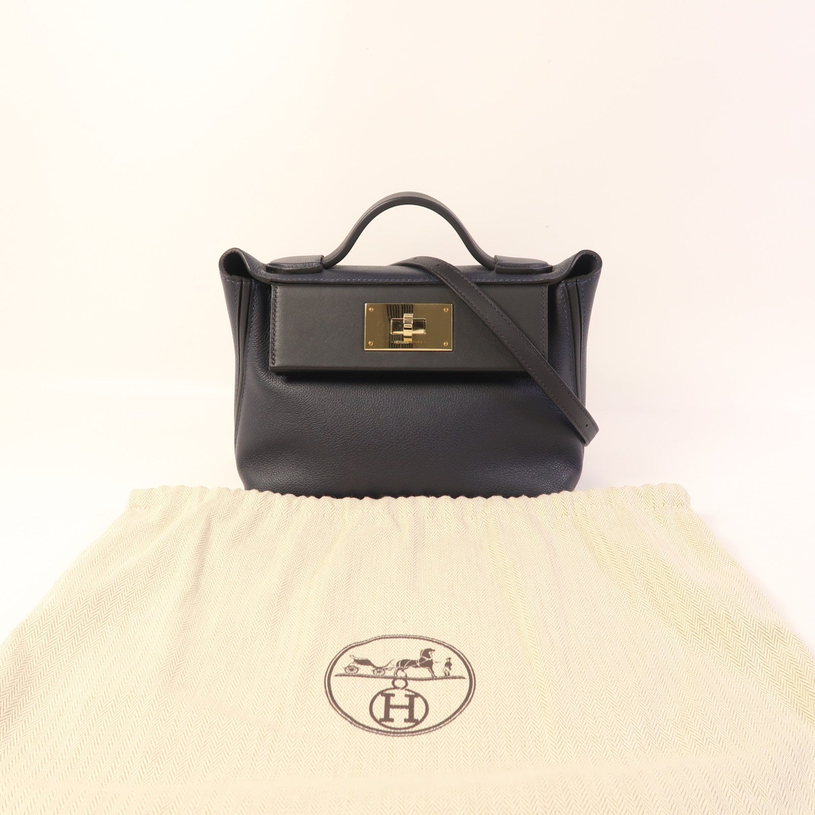 HERMES Evercolor/Swift皮革24/24 Mini金扣手挽肩背兩用袋Bleu Nuit