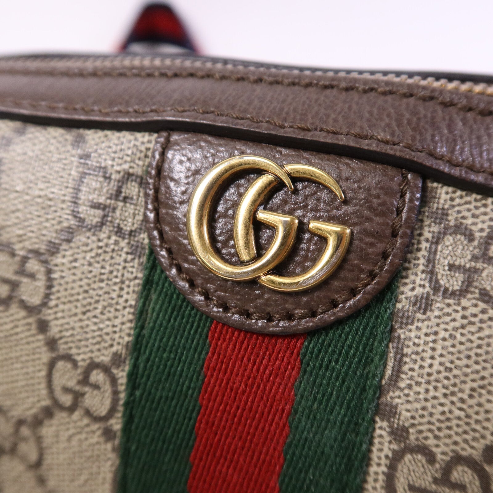 GUCCI 塗層帆布GG Supreme Wristlet Crossbody Bag金扣肩背袋