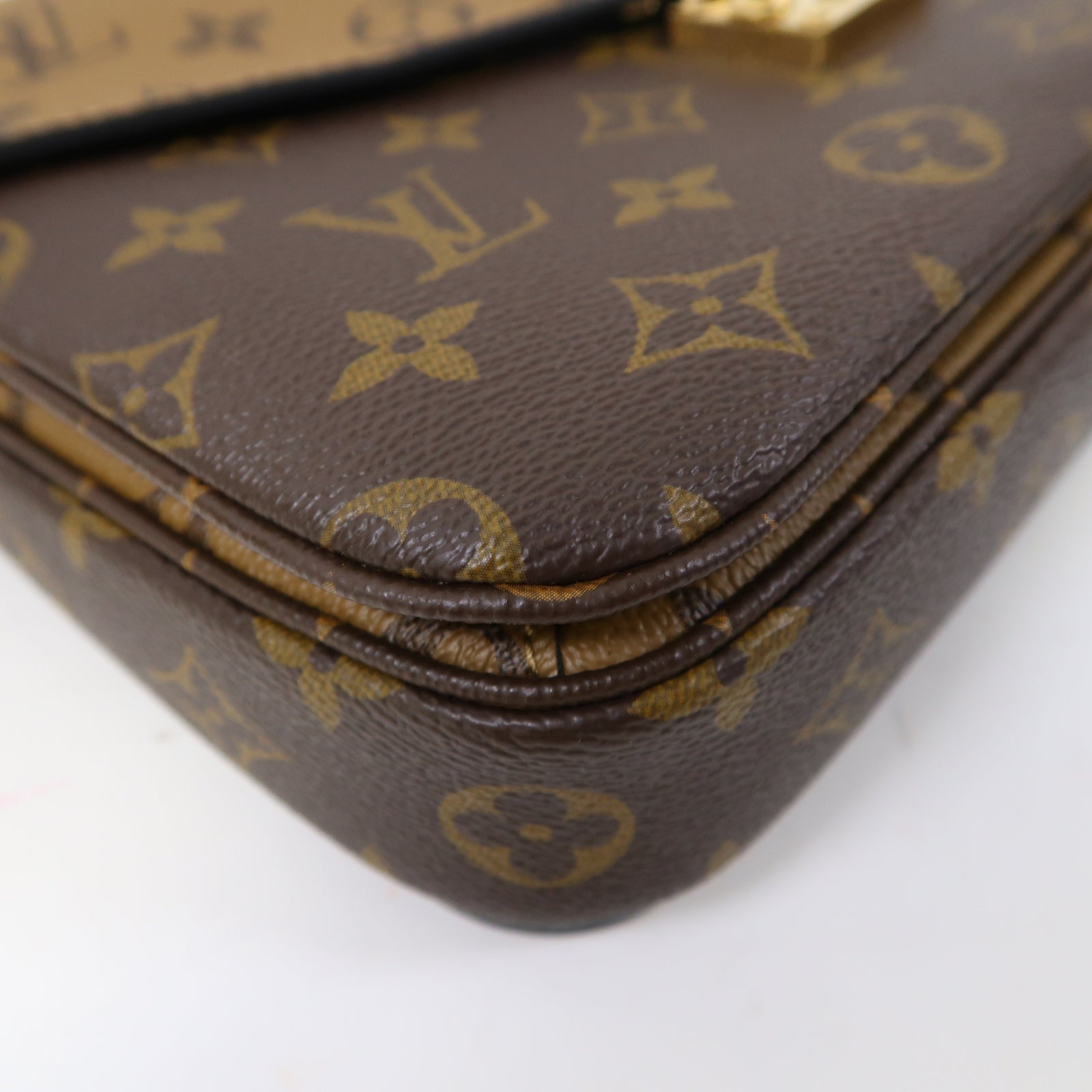 LOUIS VUITTON Monogram Reverse Pochette Métis金扣手挽肩背兩用袋啡色