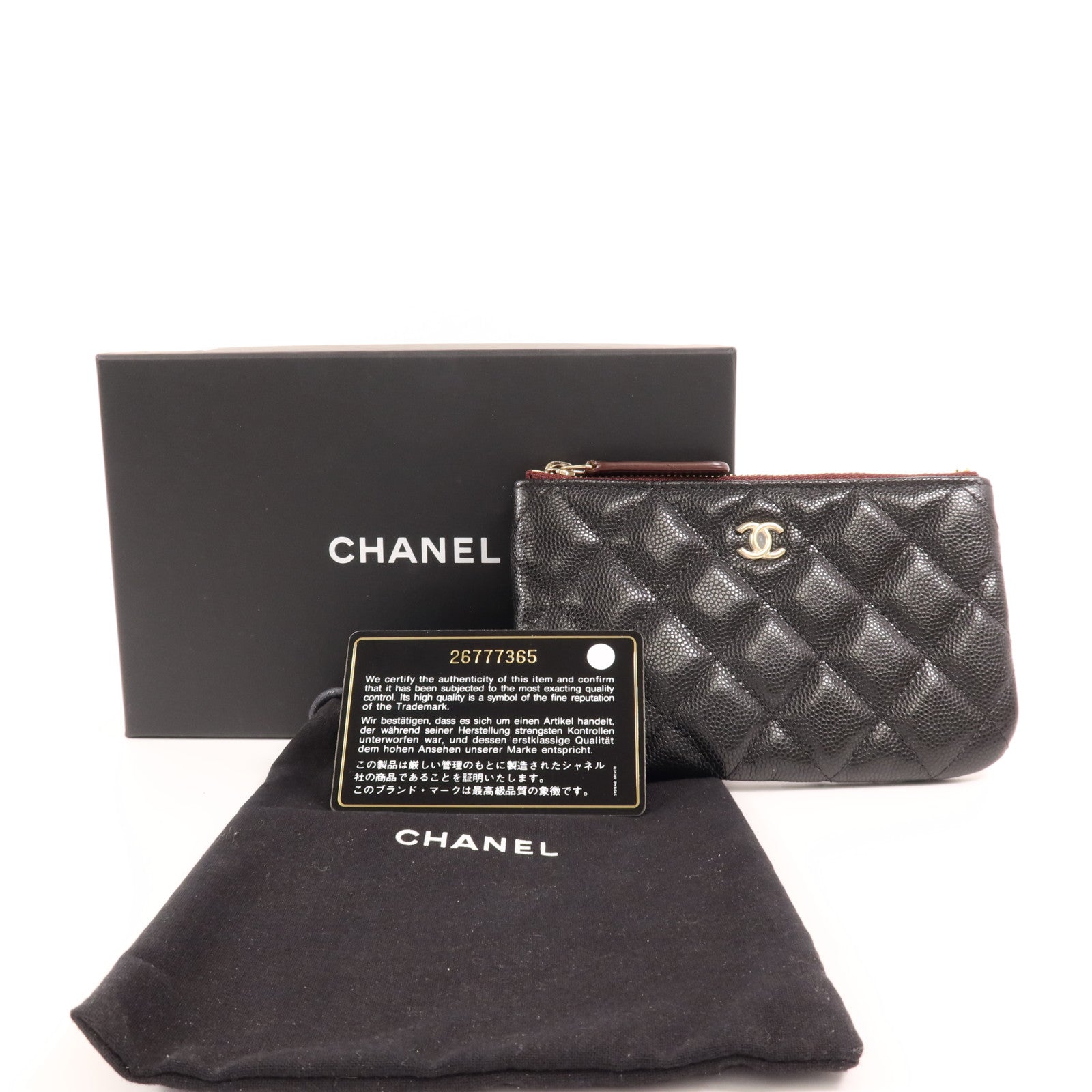 CHANEL 牛皮皮革Mini Pouch金扣手拿包