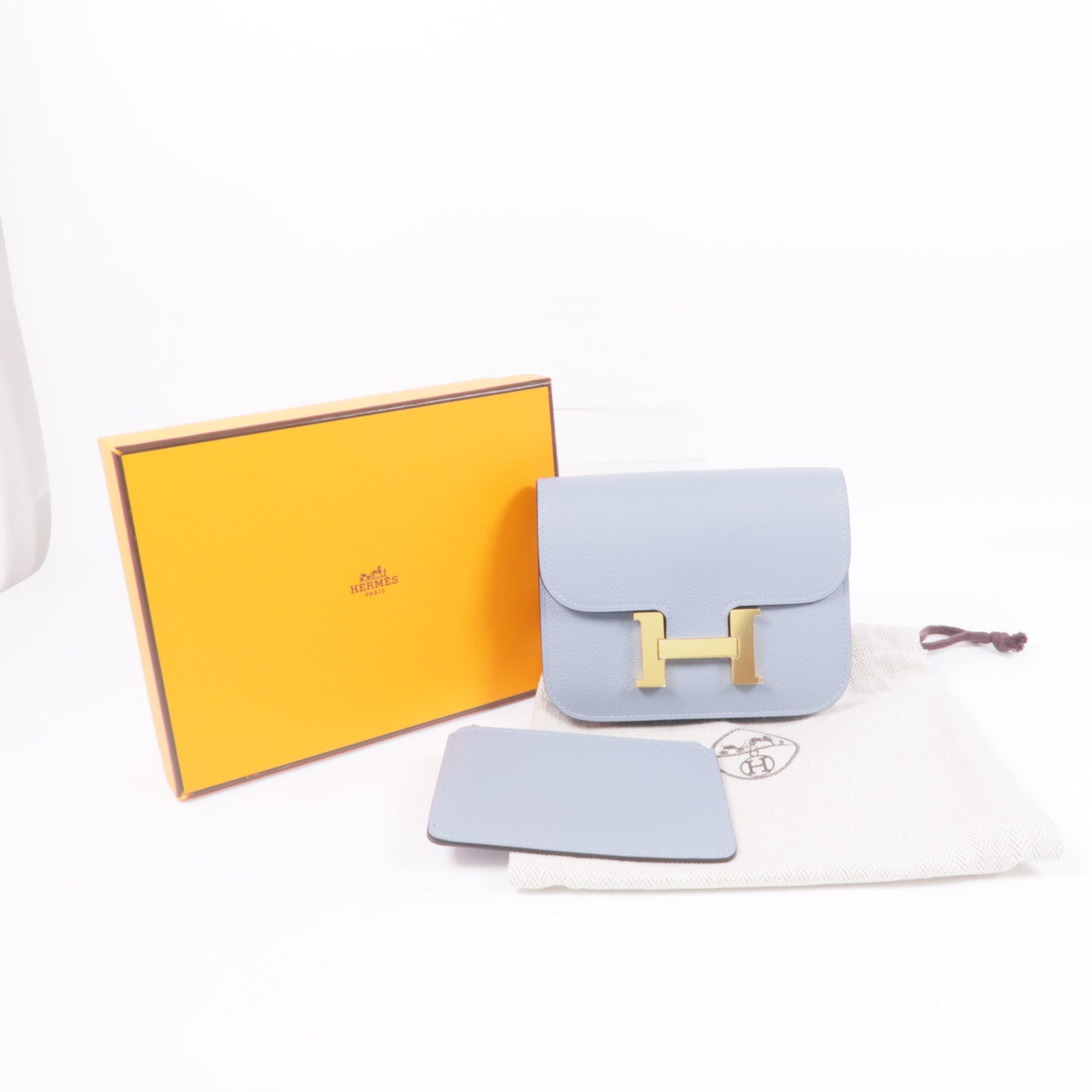 HERMES Evercolor皮革Constance Silm金扣手拿包Bleu Lin