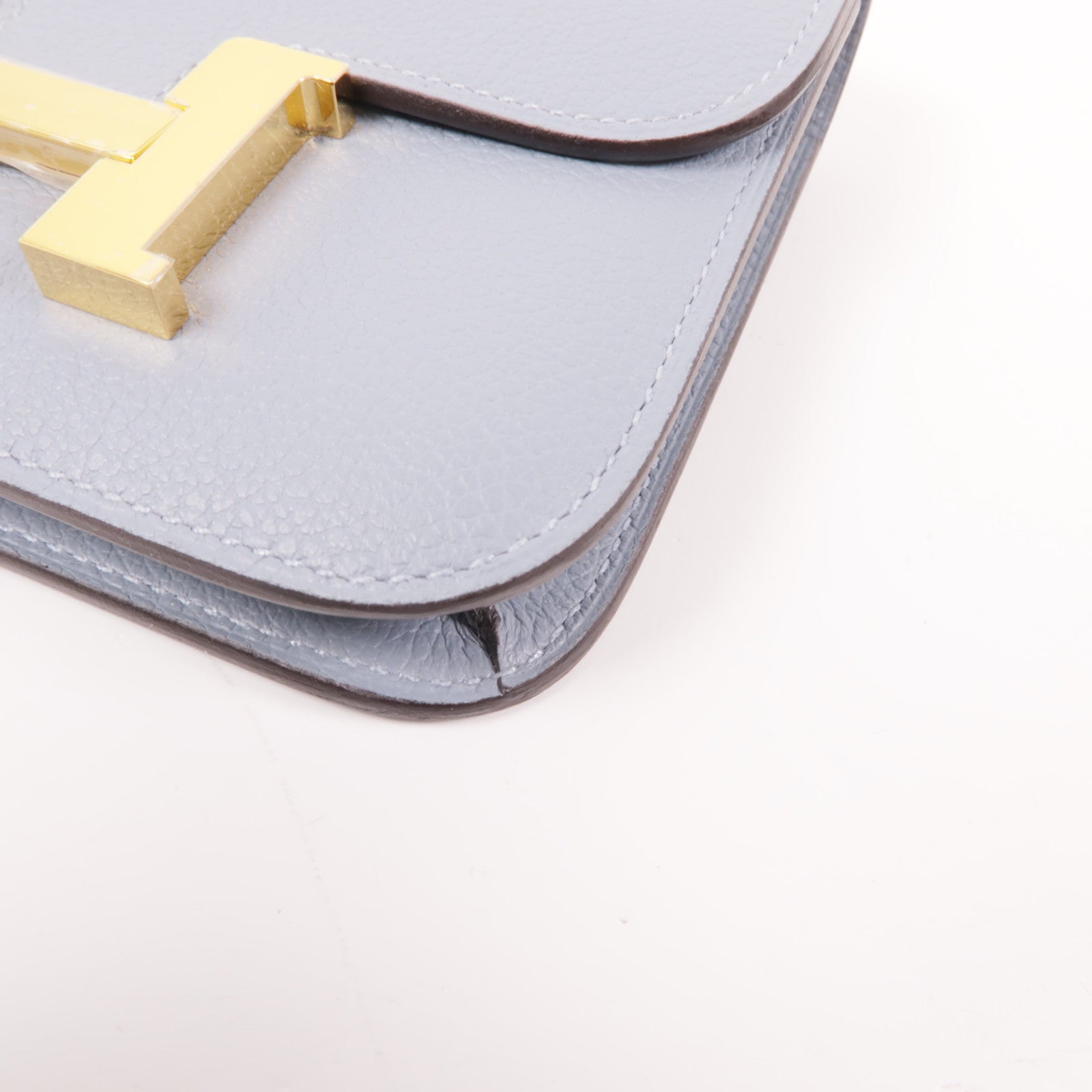 HERMES Evercolor皮革Constance Silm金扣手拿包Bleu Lin