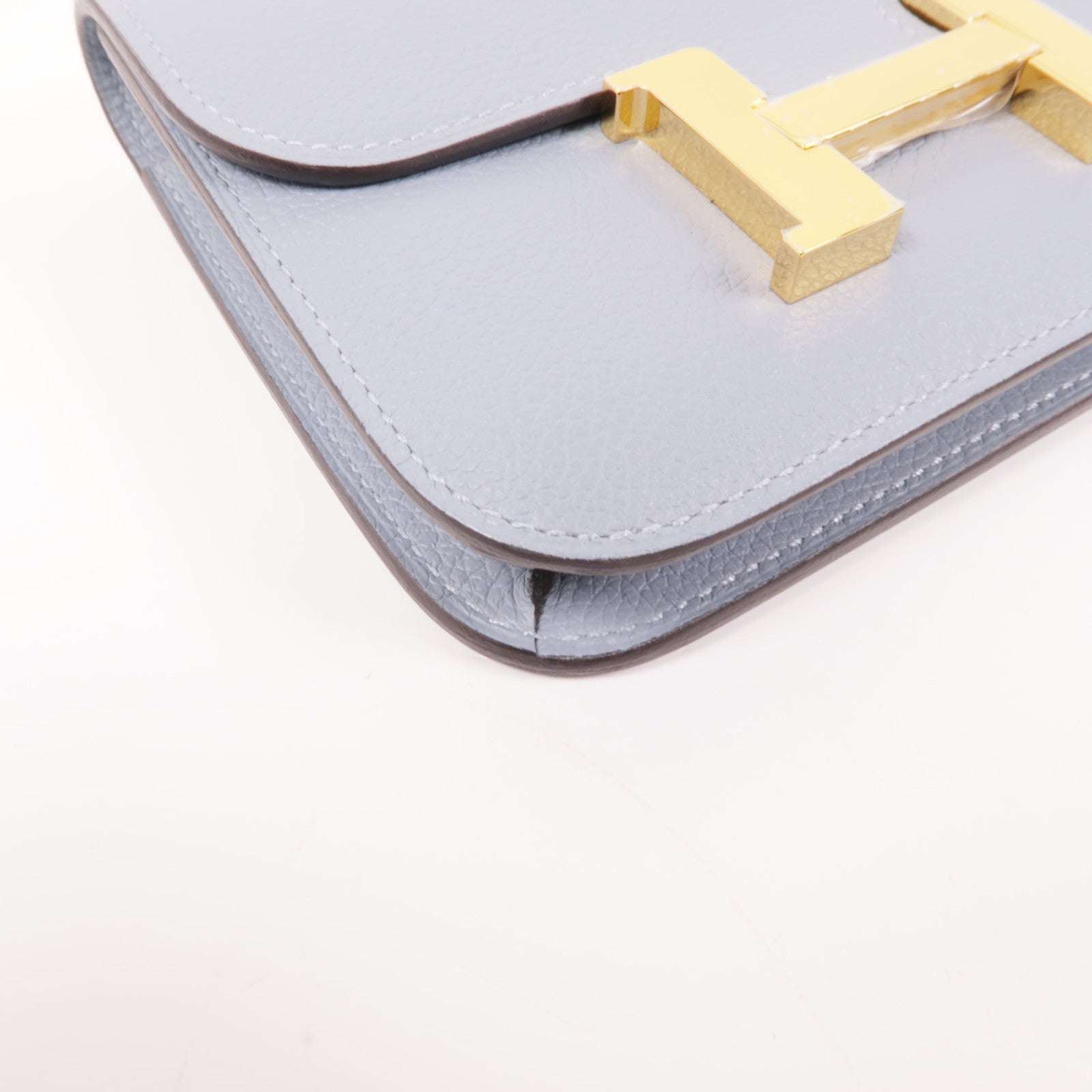 HERMES Evercolor皮革Constance Silm金扣手拿包Bleu Lin