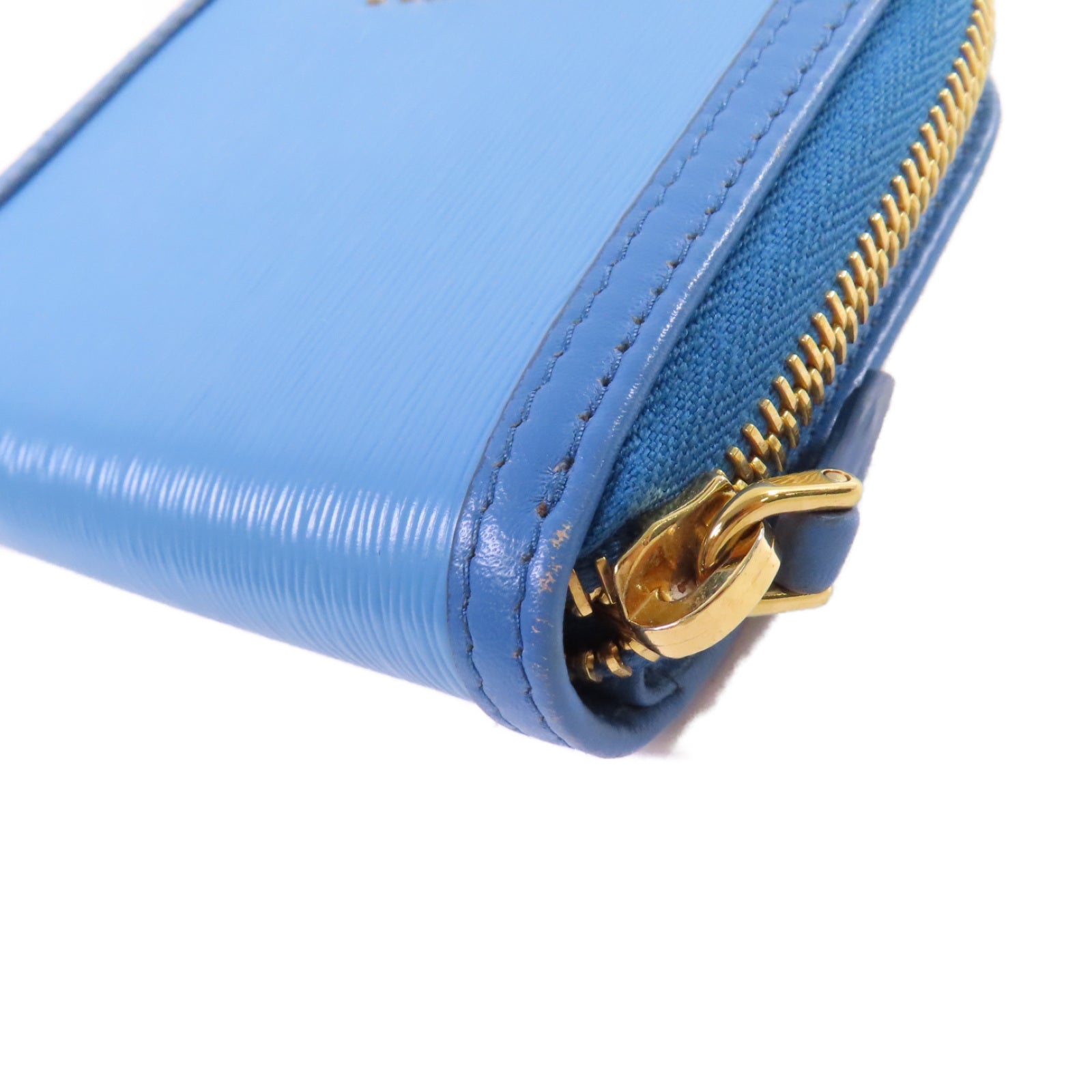 PRADA 牛皮皮革Round Zip Wallet金扣拉鏈短錢包淺藍色