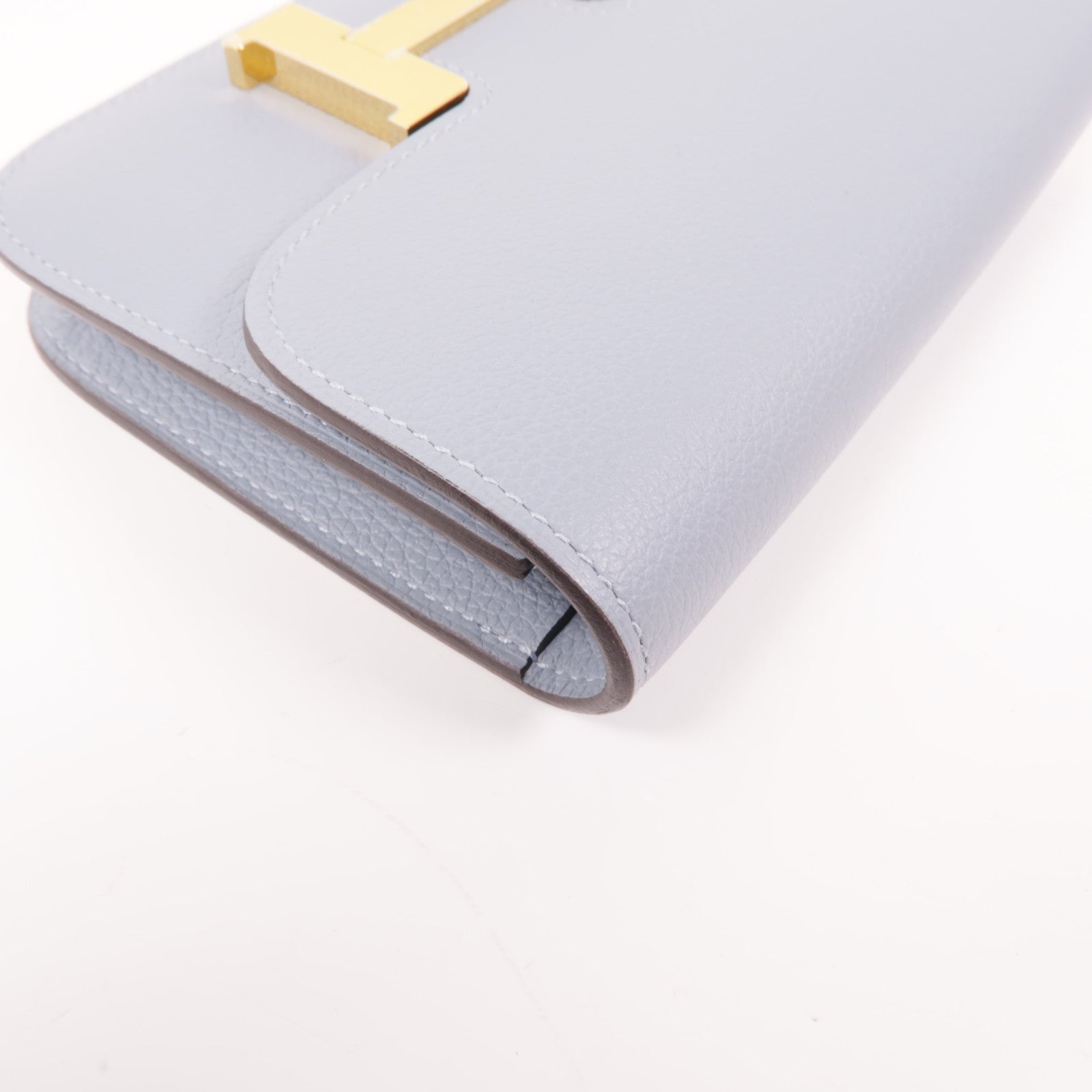 HERMES Evercolor皮革Constance Silm金扣手拿包Bleu Lin