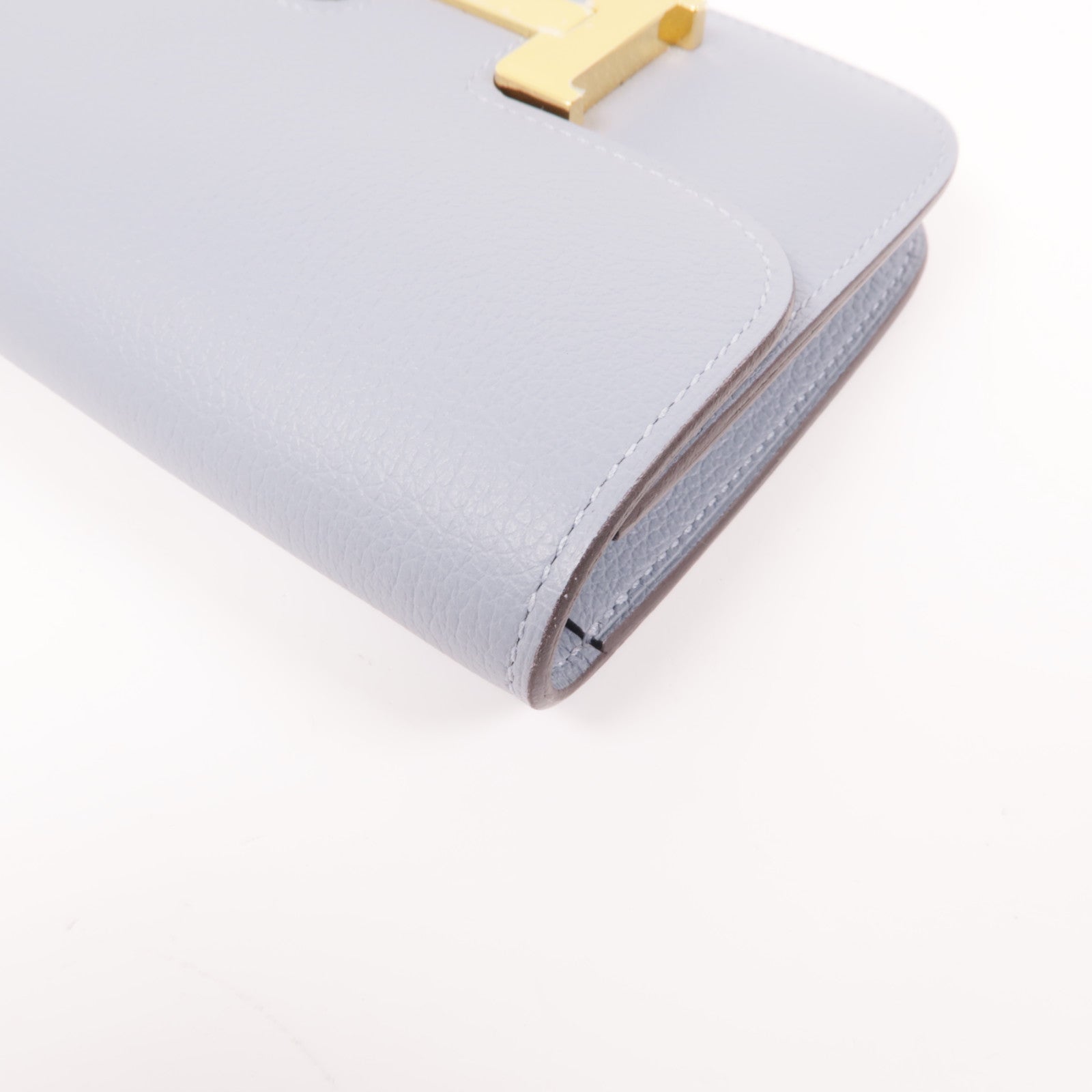 HERMES Evercolor皮革Constance Silm金扣手拿包Bleu Lin