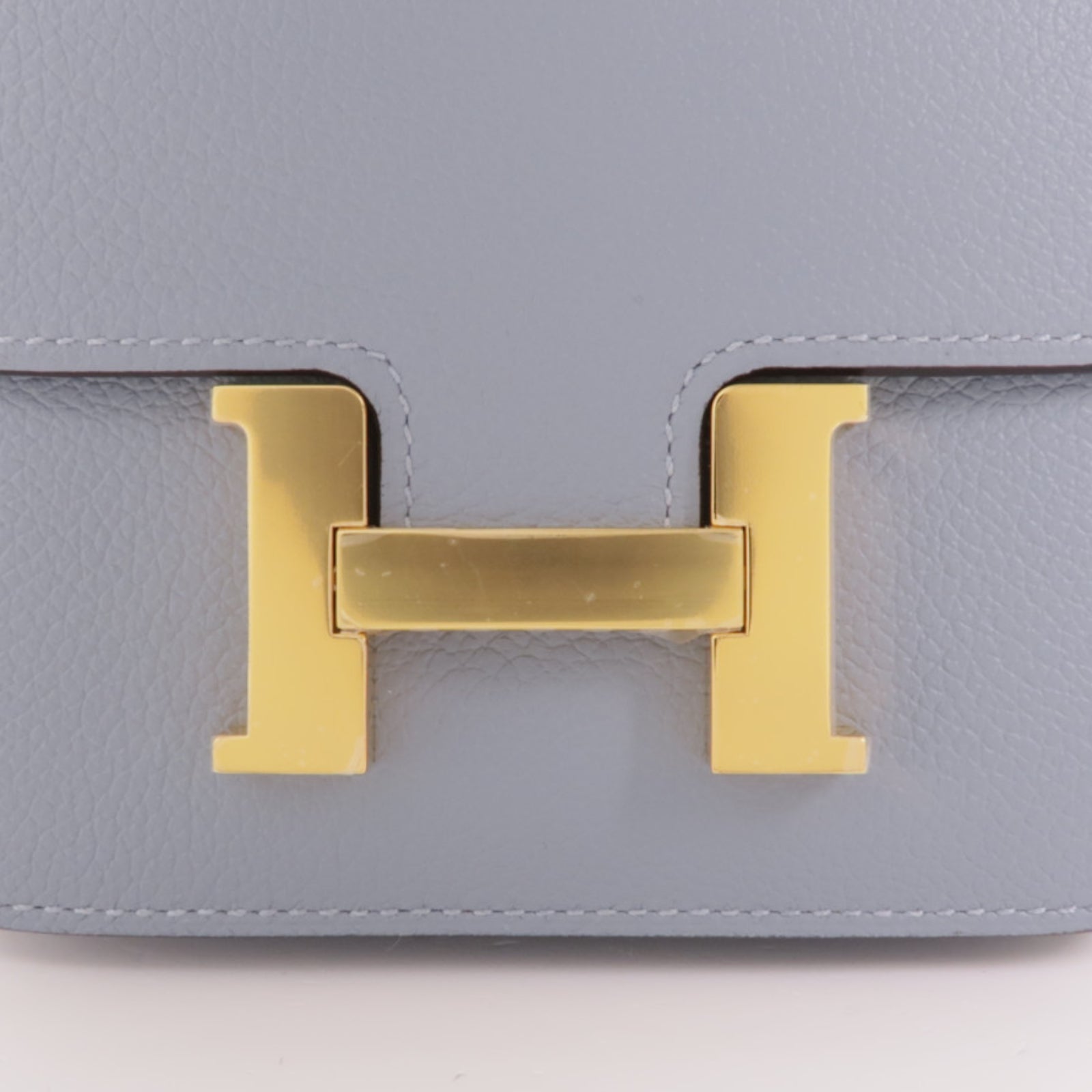 HERMES Evercolor皮革Constance Silm金扣手拿包Bleu Lin
