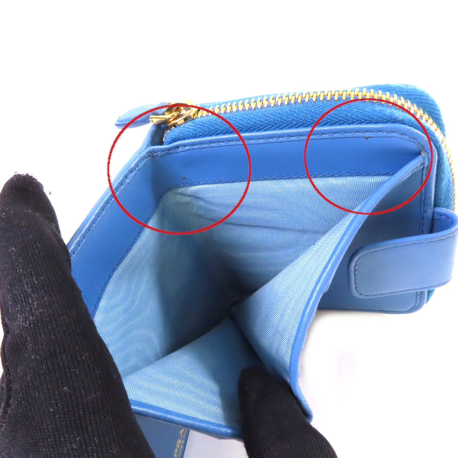 PRADA 牛皮皮革Round Zip Wallet金扣拉鏈短錢包淺藍色