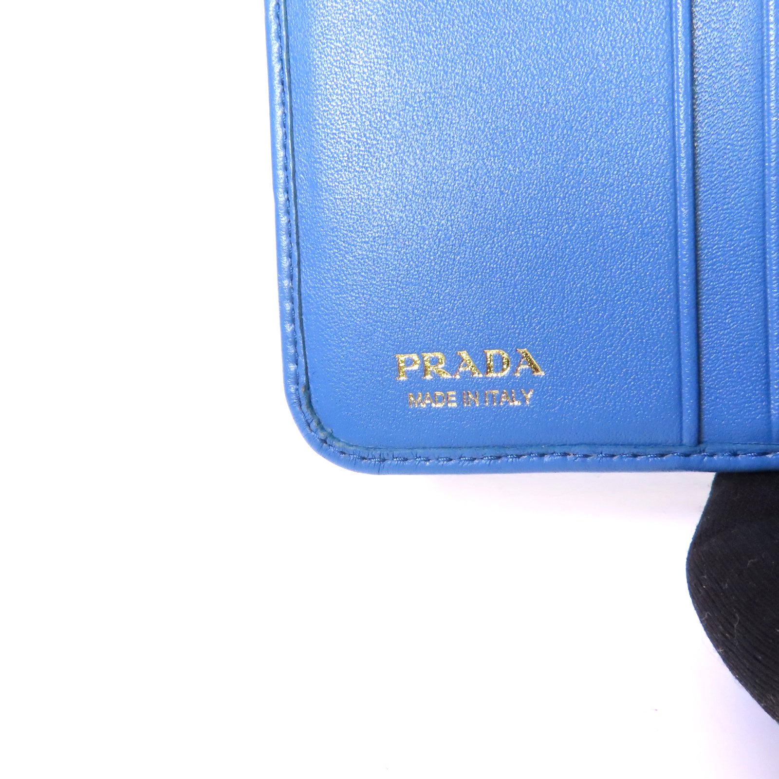 PRADA 牛皮皮革Round Zip Wallet金扣拉鏈短錢包淺藍色