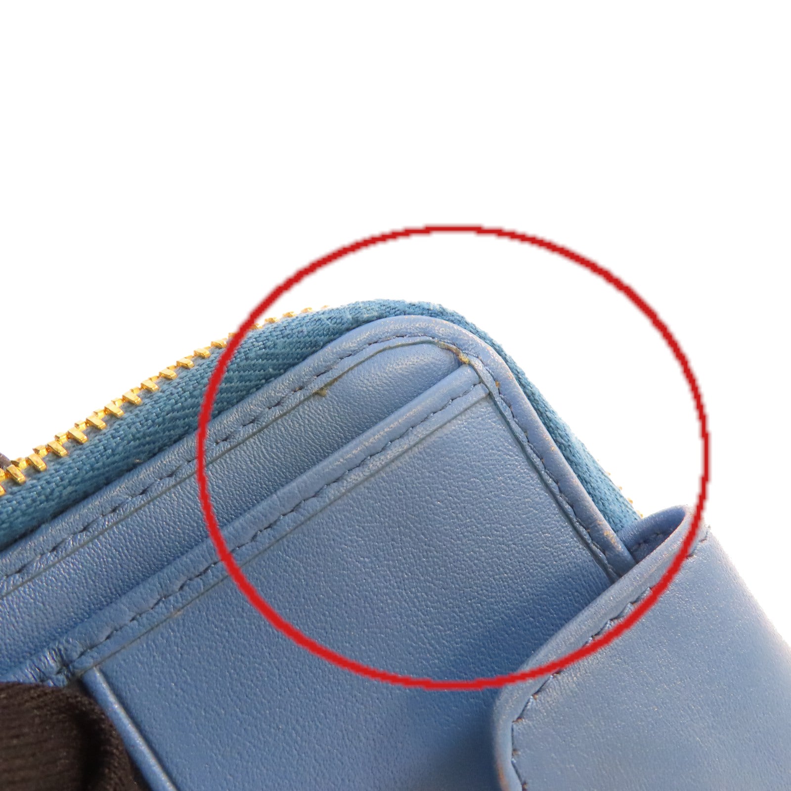PRADA 牛皮皮革Round Zip Wallet金扣拉鏈短錢包淺藍色