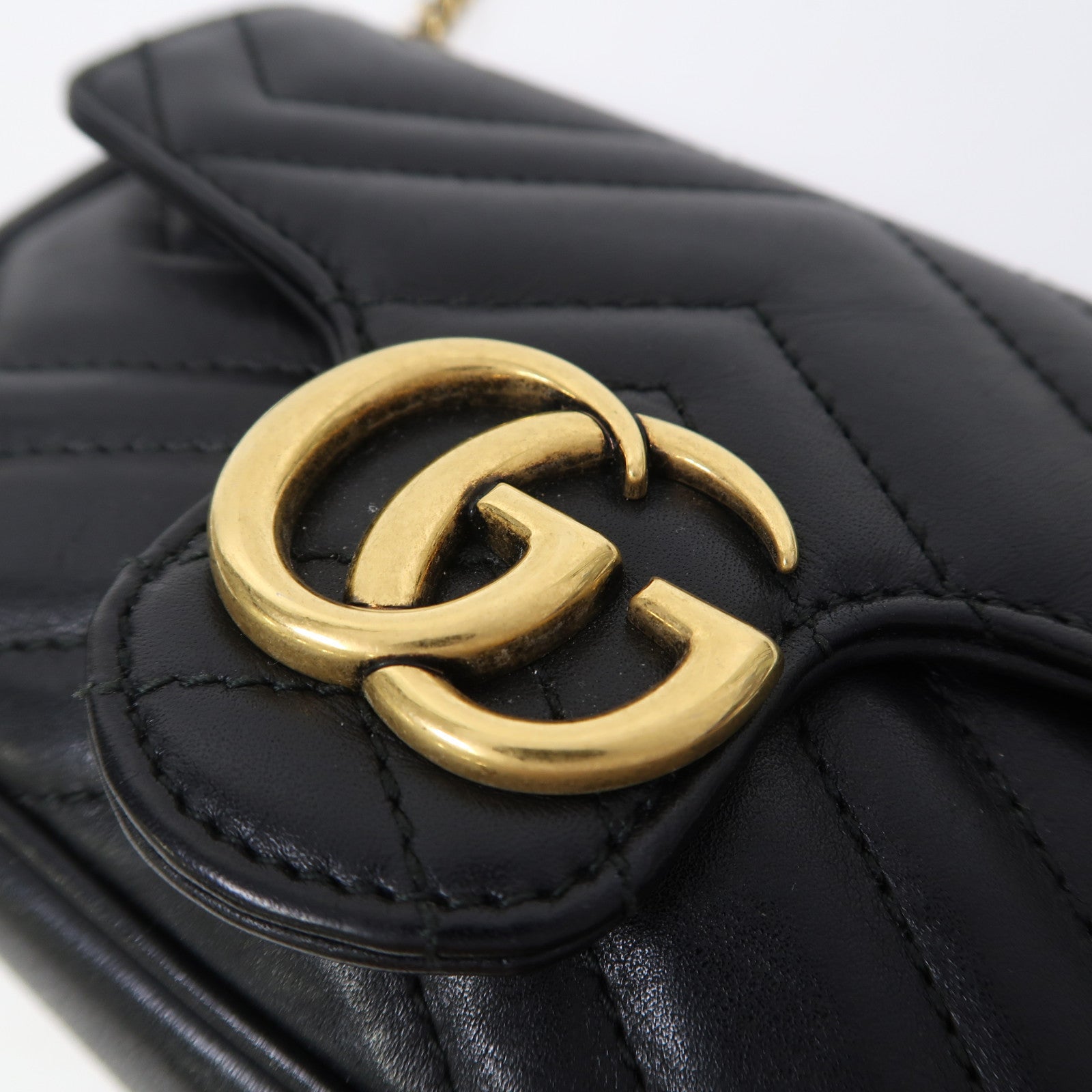 GUCCI 牛皮皮革GG Marmont Super Mini金扣鏈帶肩背袋黑色
