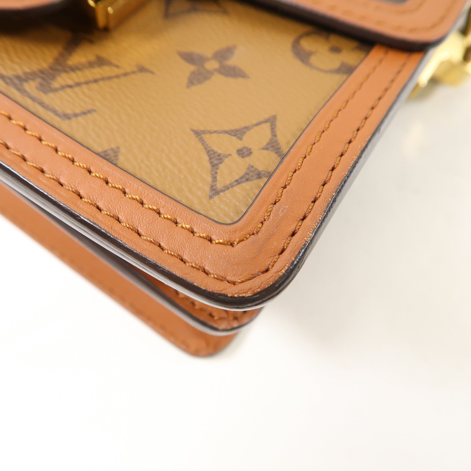LOUIS VUITTON Monogram Reverse Mini Dauphine金扣肩背袋啡色
