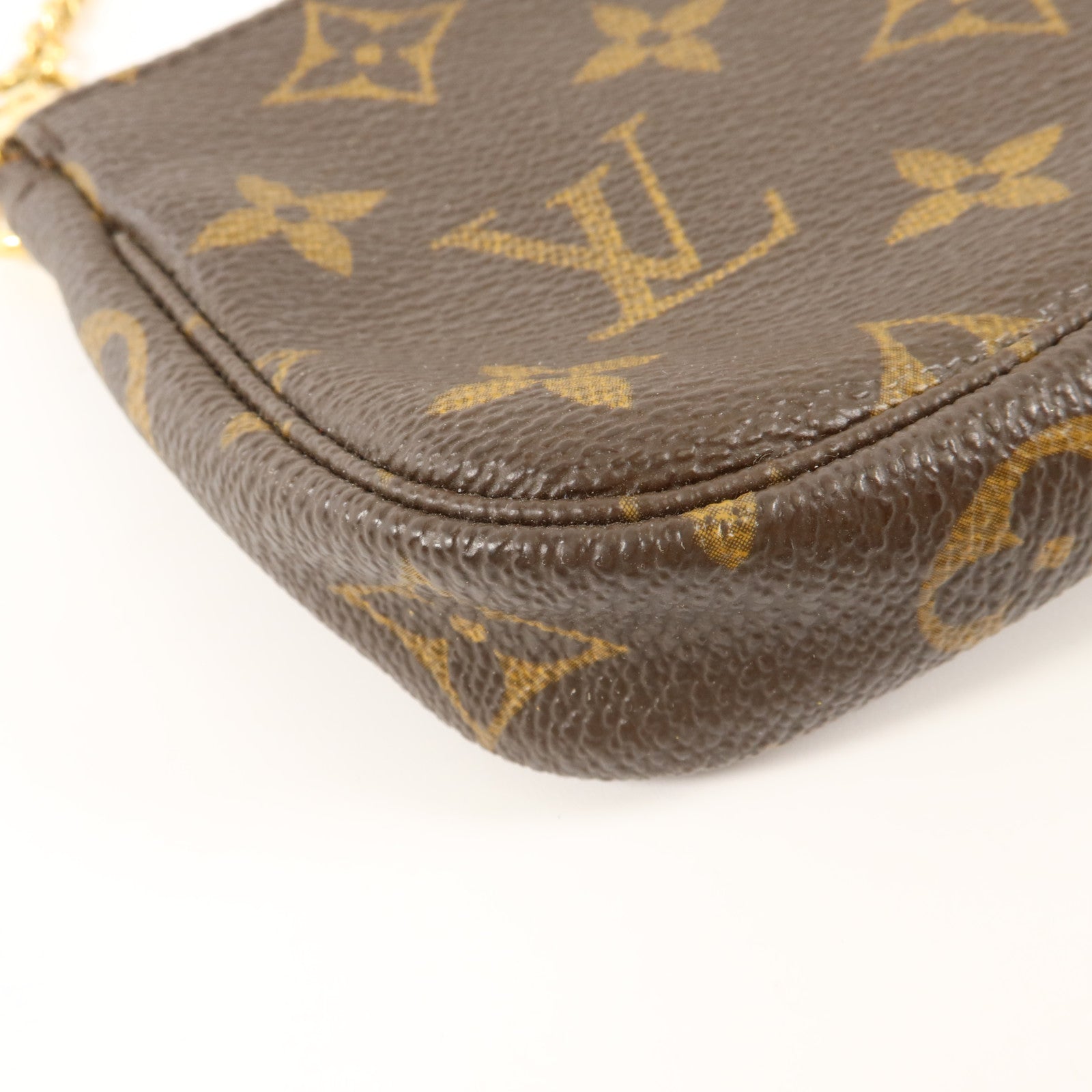 LOUIS VUITTON Monogram Mini Pochette Accessoires金扣手挽袋