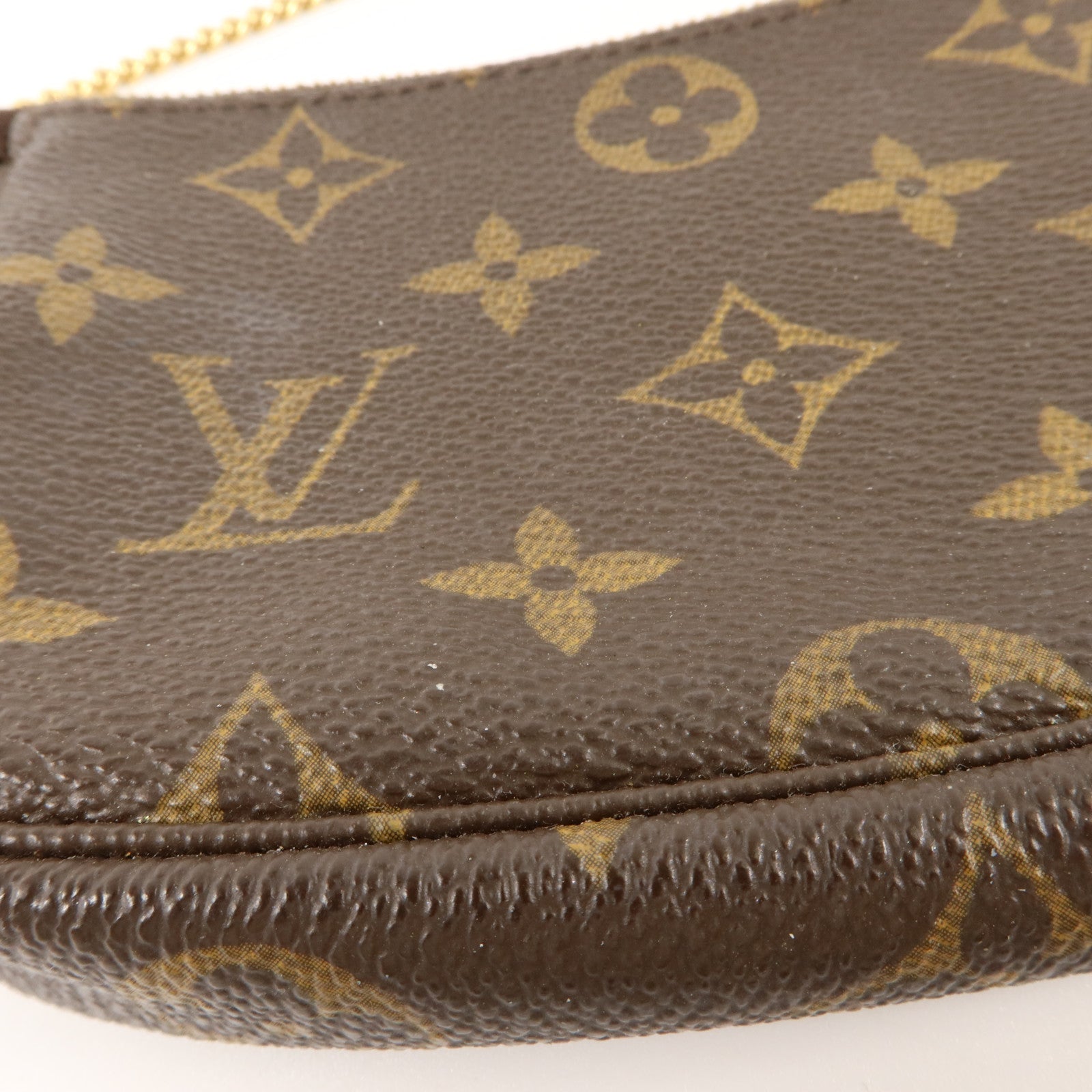 LOUIS VUITTON Monogram Mini Pochette Accessoires金扣手挽袋