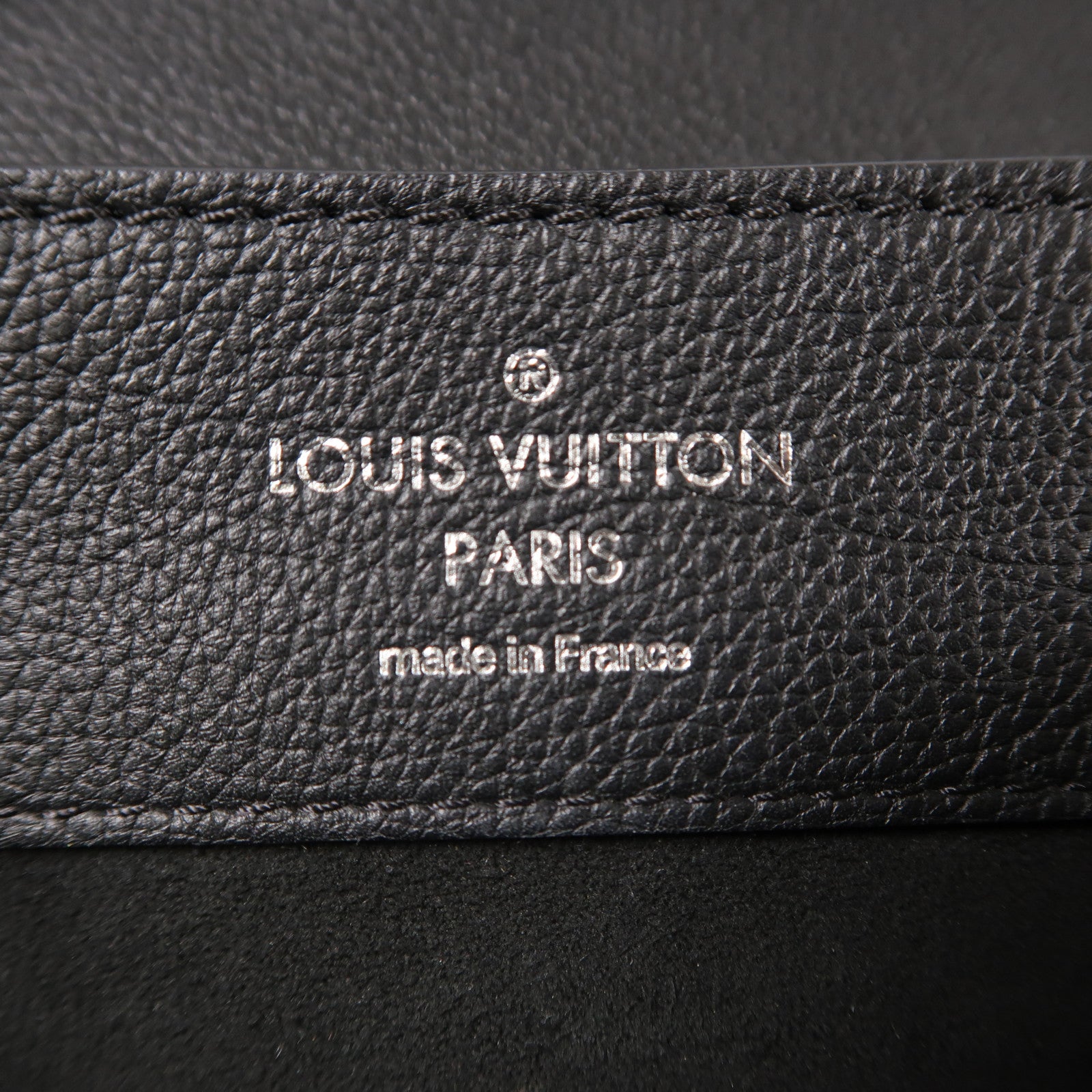 LOUIS VUITTON 牛皮皮革Lock Me Backpack銀扣背包