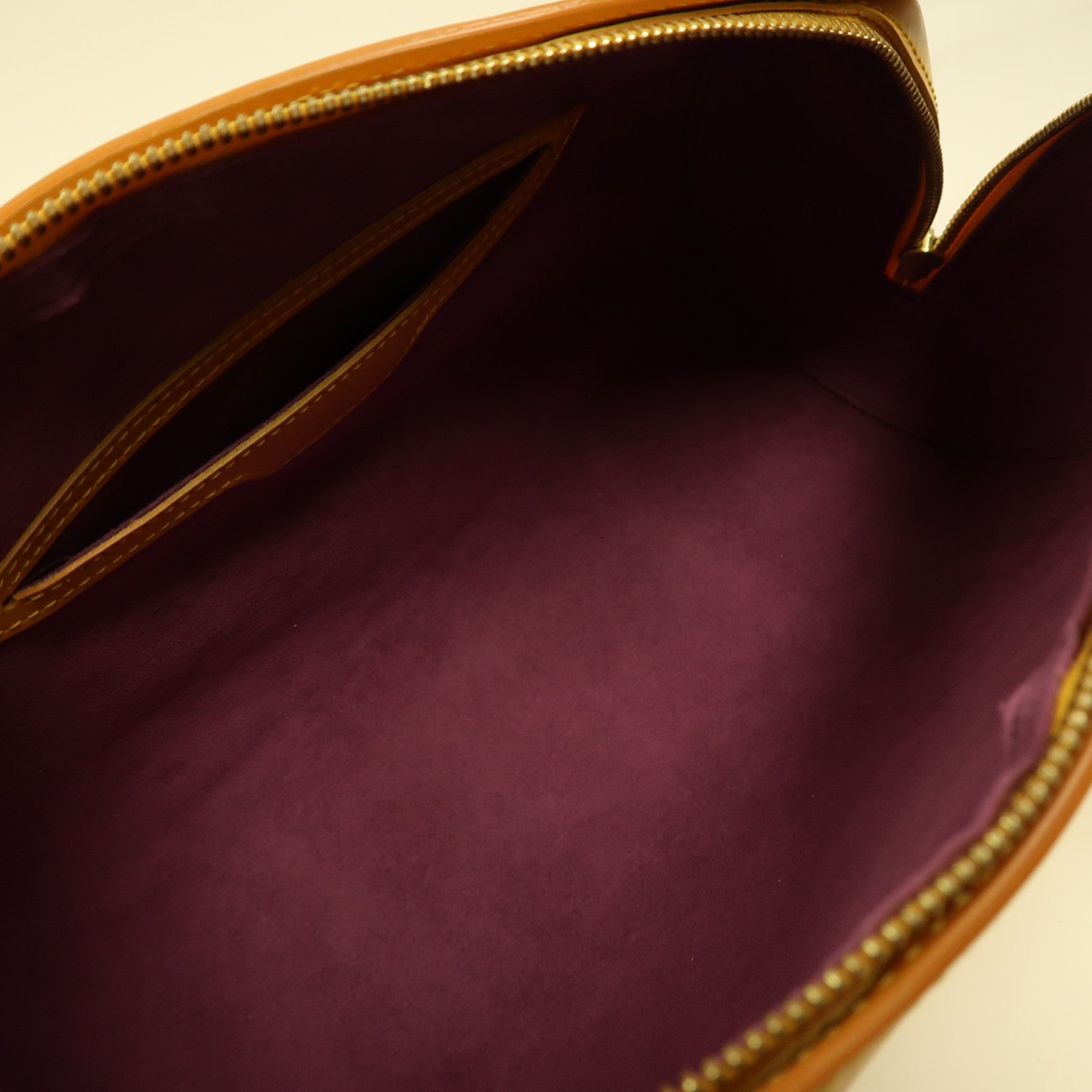 LOUIS VUITTON Epi皮革Soufflot金扣手挽袋黃色