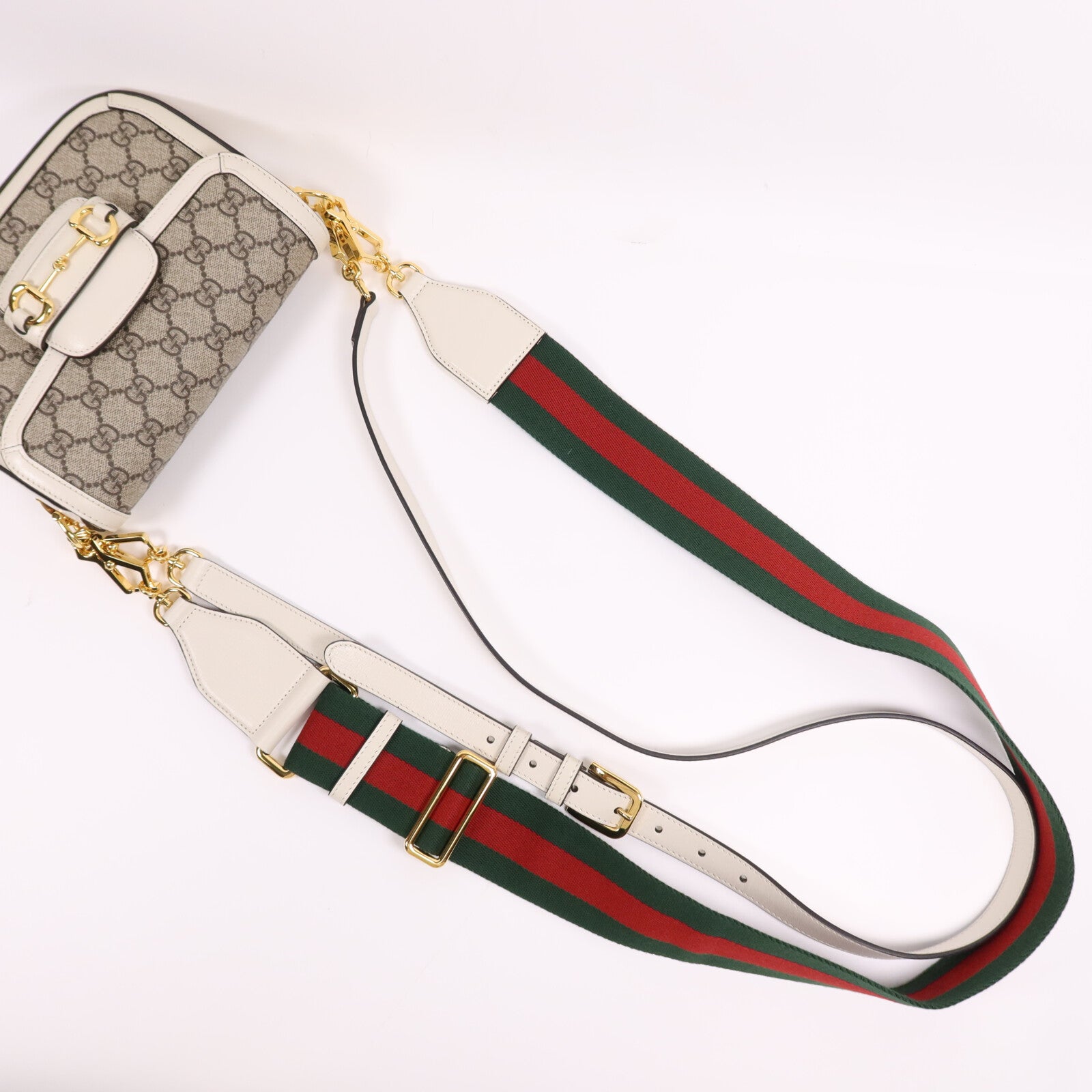 GUCCI 塗層帆布/牛皮皮革Horsebit 1955金扣肩背袋