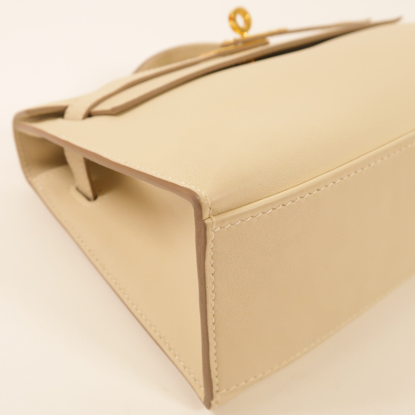 HERMES Swift皮革Pochette Kelly金扣手挽袋Nata
