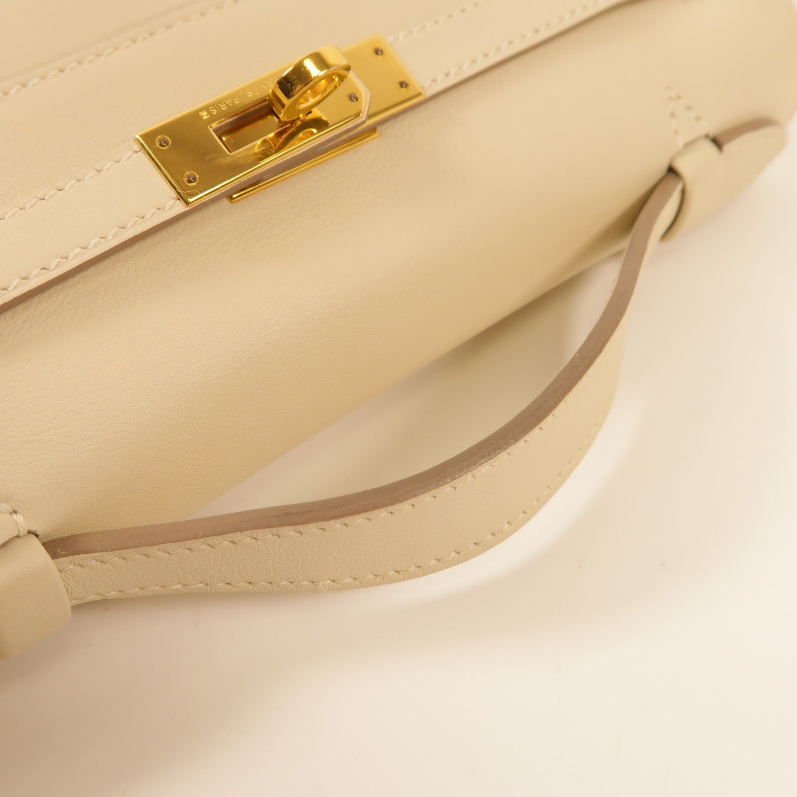 HERMES Swift皮革Pochette Kelly金扣手挽袋Nata