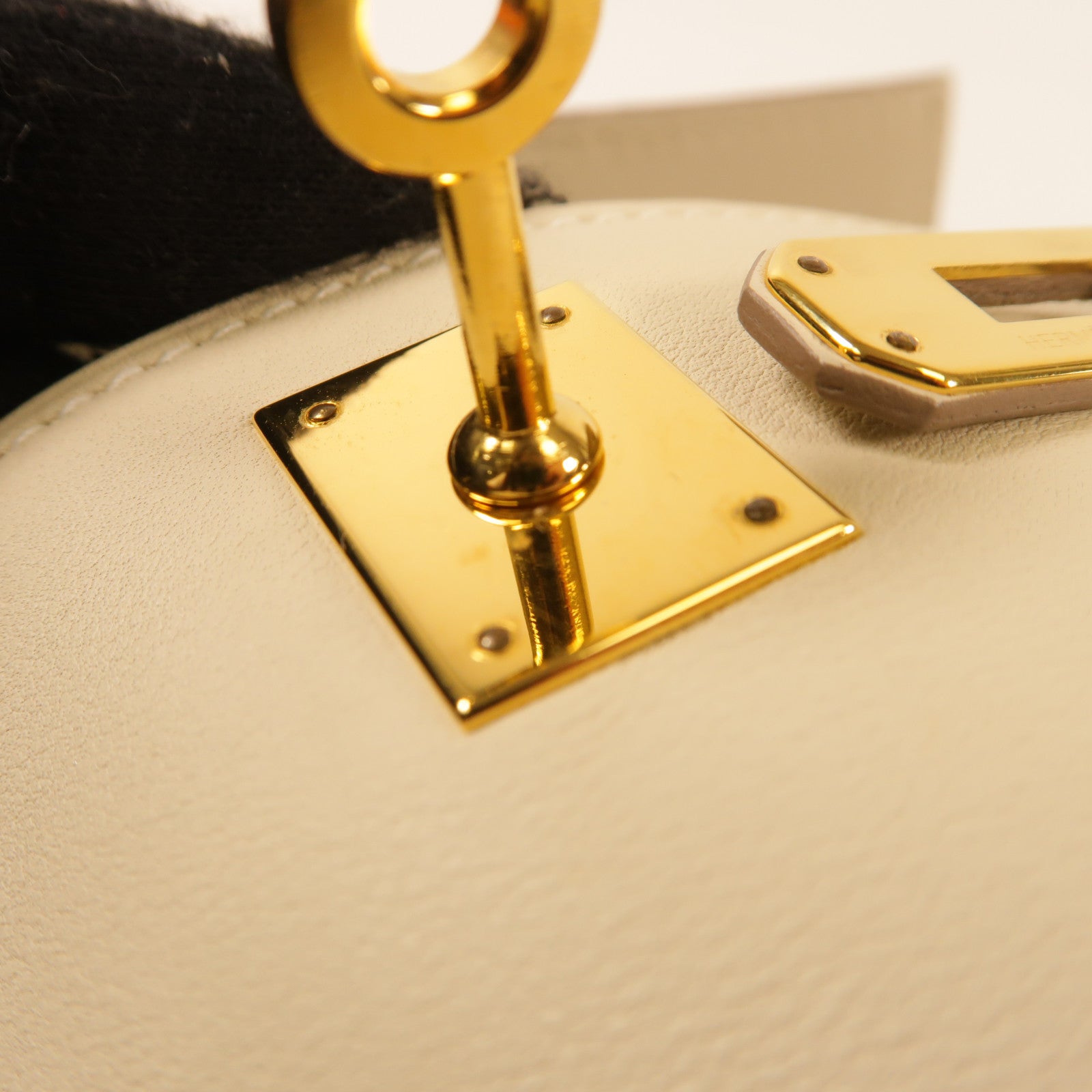 HERMES Swift皮革Pochette Kelly金扣手挽袋Nata