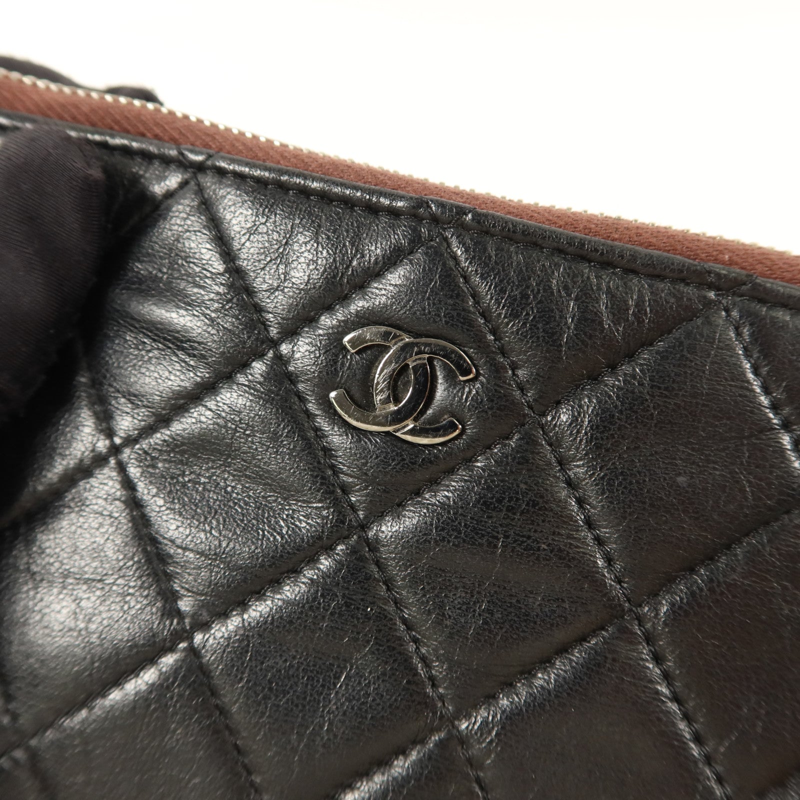 CHANEL 羊皮皮革Mini Zip Pouch手拿包