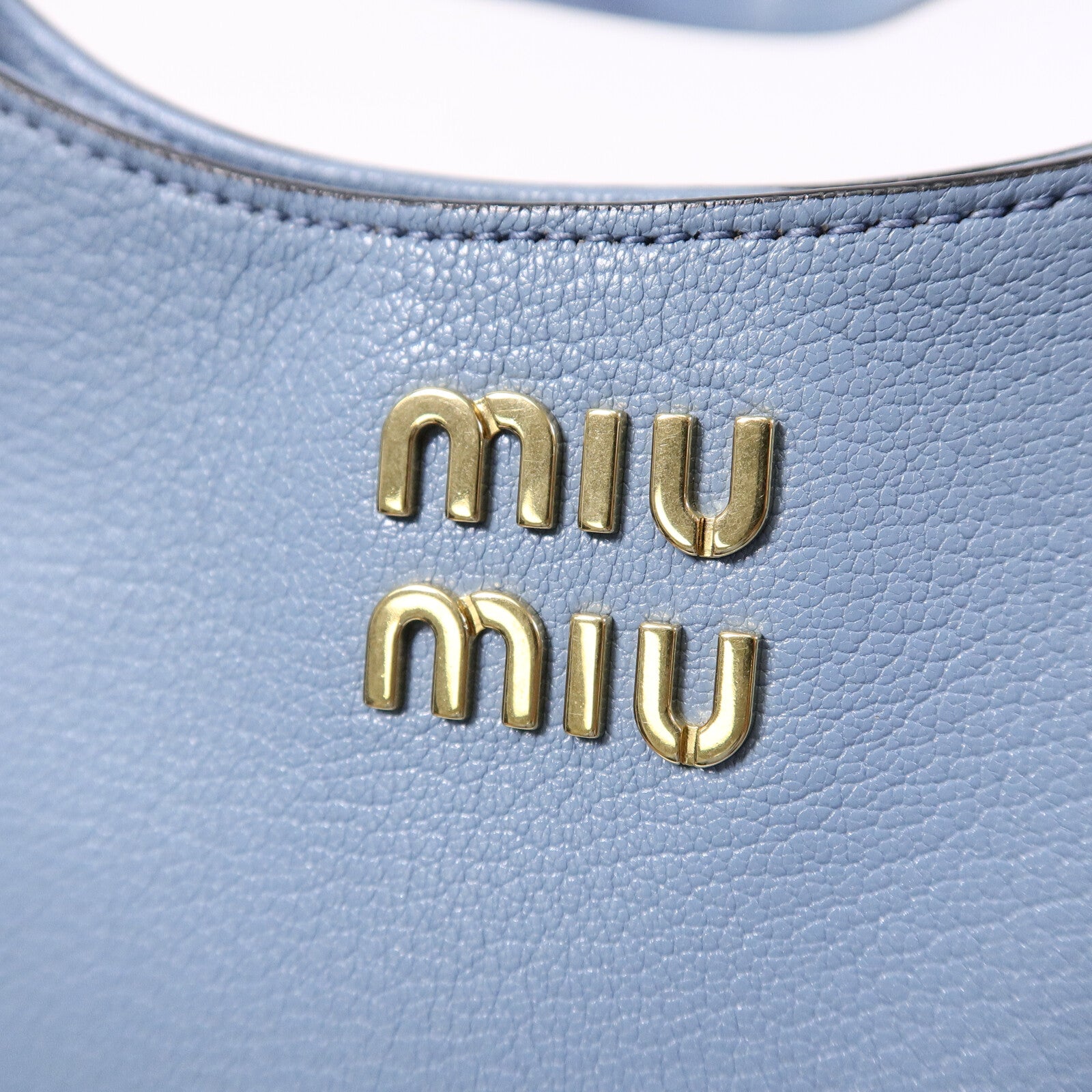 Miu Miu 牛皮皮革Hobo肩背袋