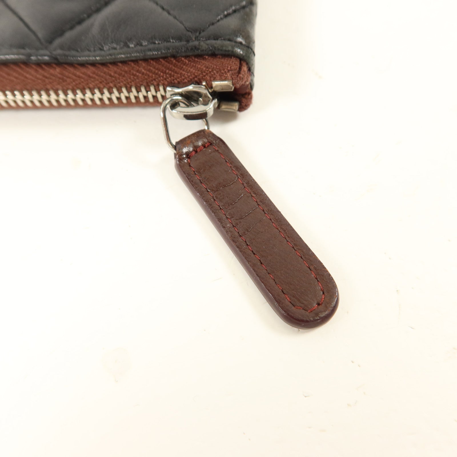 CHANEL 羊皮皮革Mini Zip Pouch手拿包
