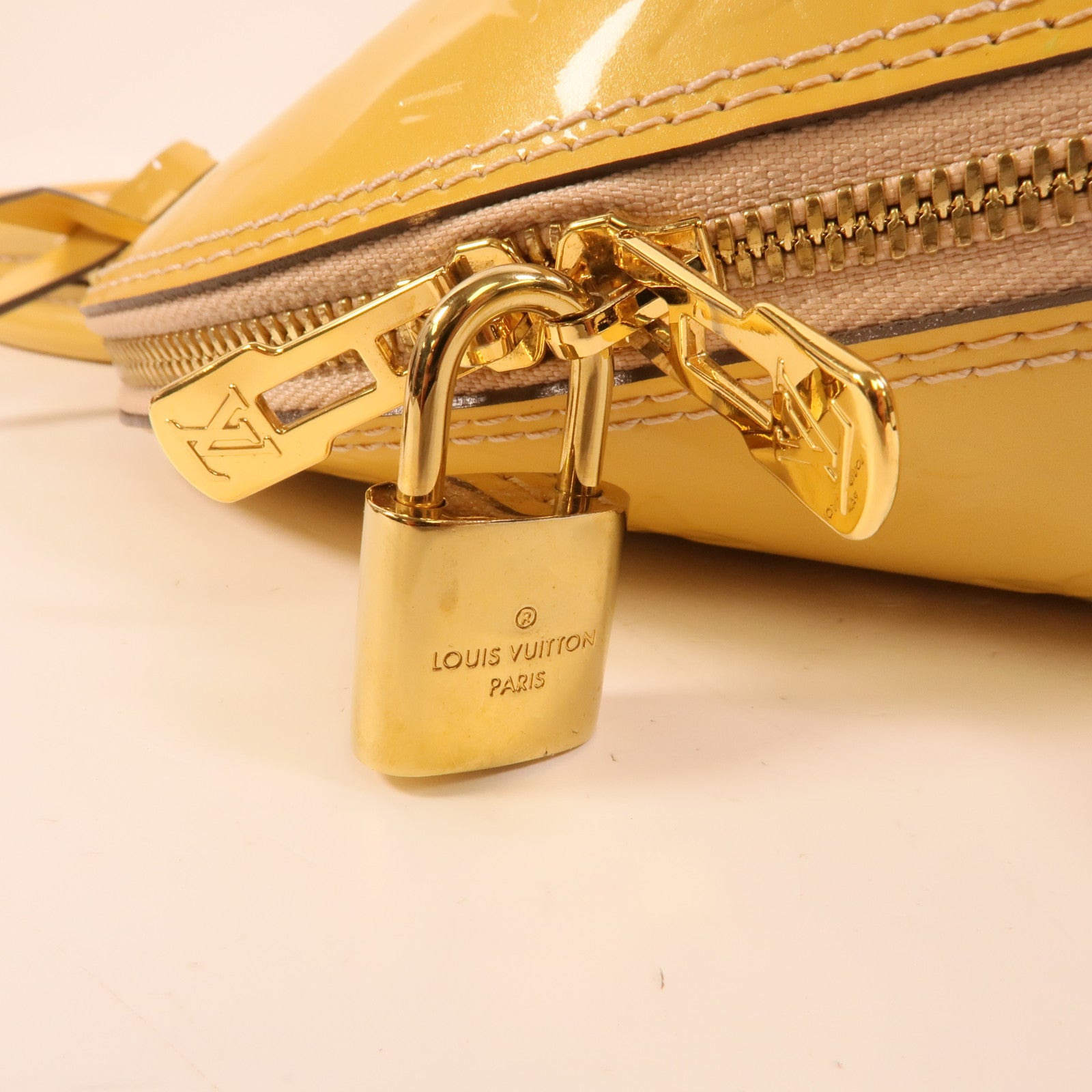 LOUIS VUITTON Monogram Vernis Alma PM金扣手挽袋