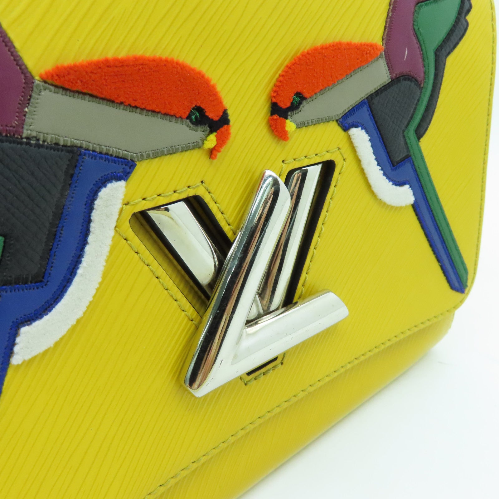 LOUIS VUITTON Epi Twist MM silver buckle chain shoulder bag yellow