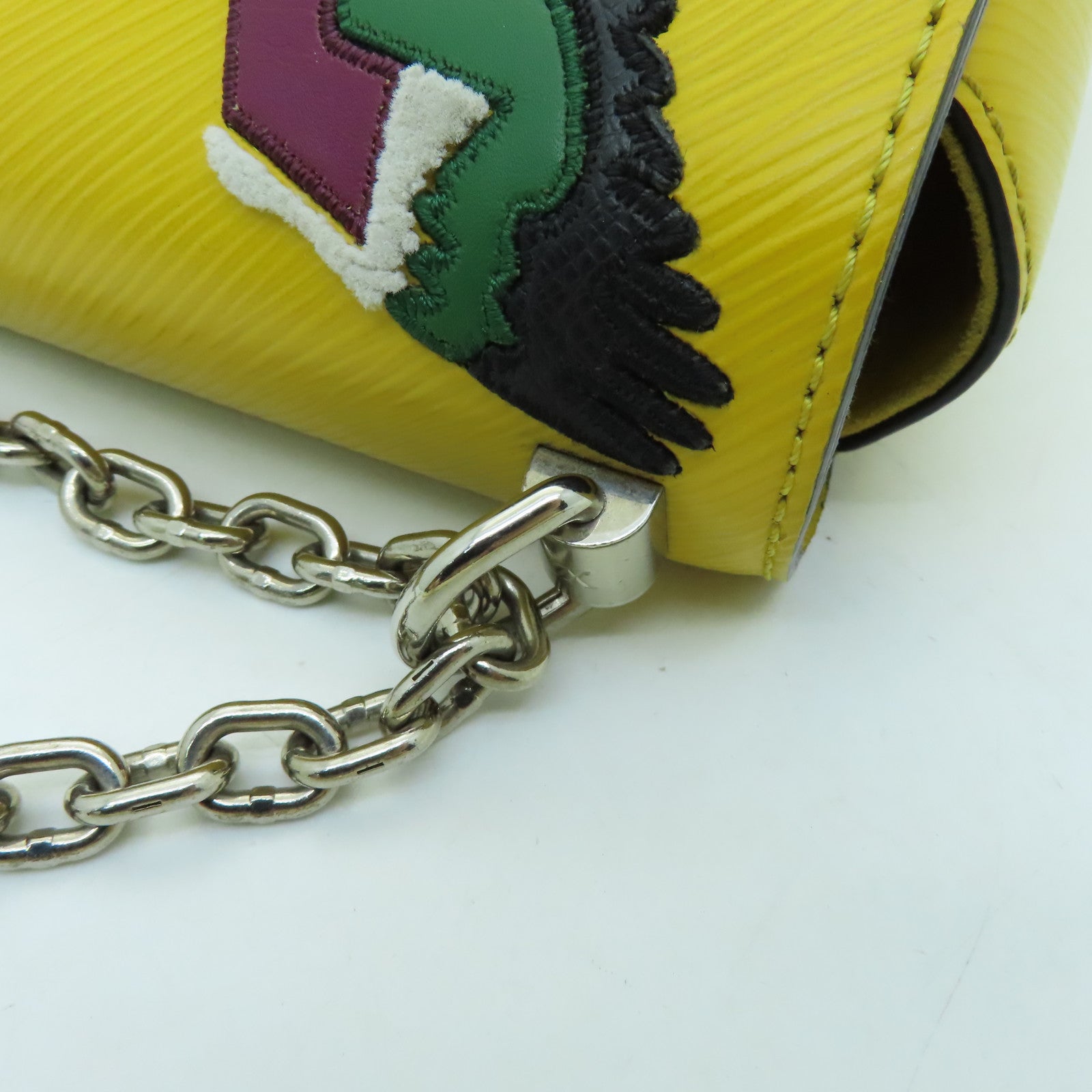 LOUIS VUITTON Epi Twist MM silver buckle chain shoulder bag yellow