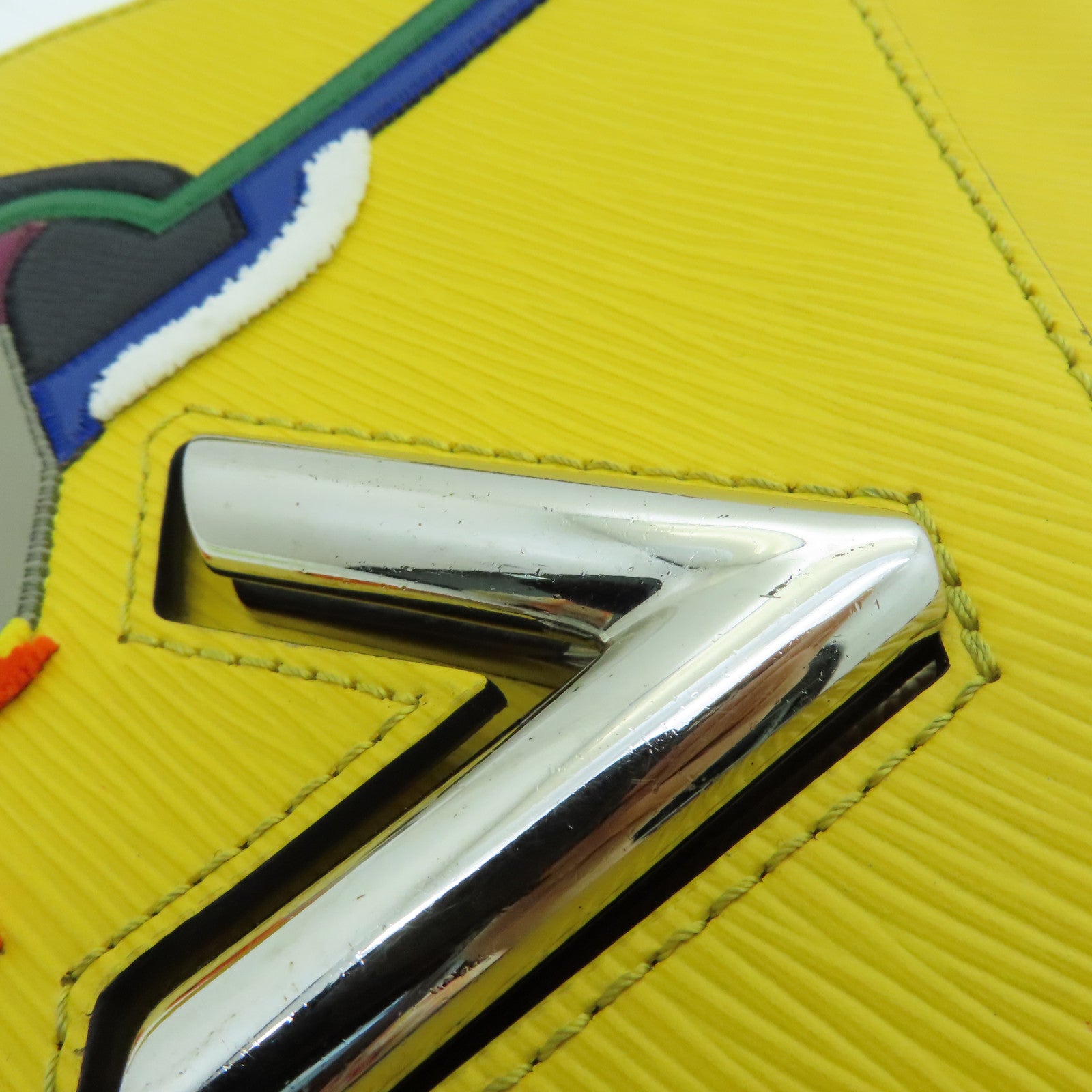 LOUIS VUITTON Epi Twist MM silver buckle chain shoulder bag yellow
