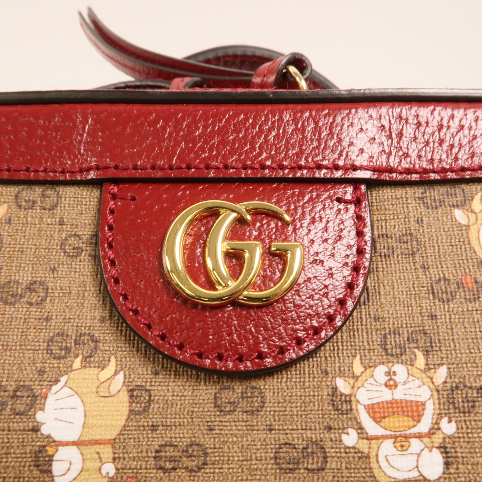 GUCCI 塗層帆布Doraemon Micro GG Supreme鏈帶手挽肩背兩用袋