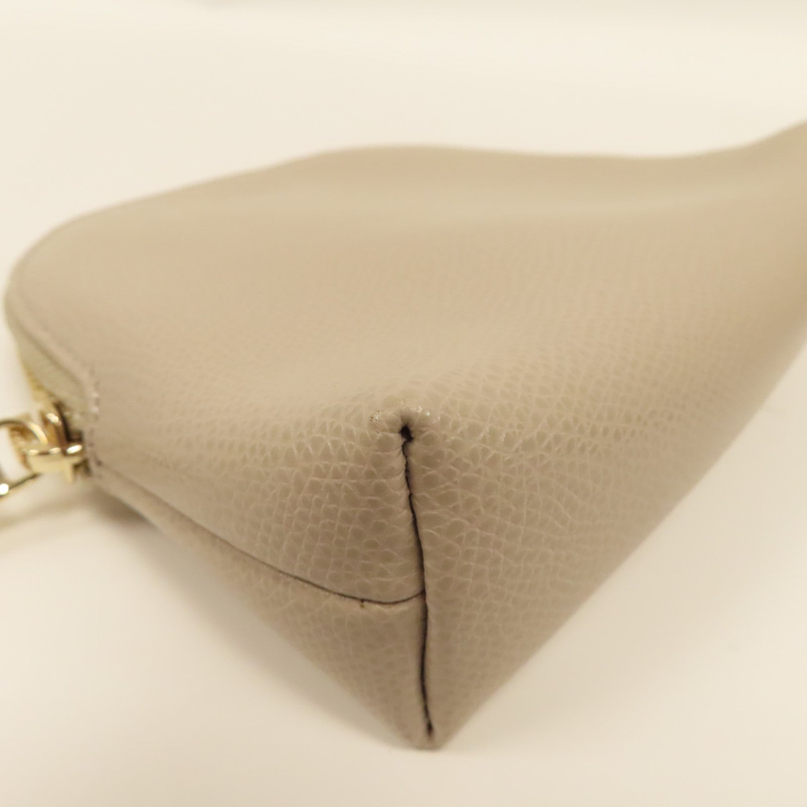 Furla 牛皮皮革Pouch金扣手拿包米色