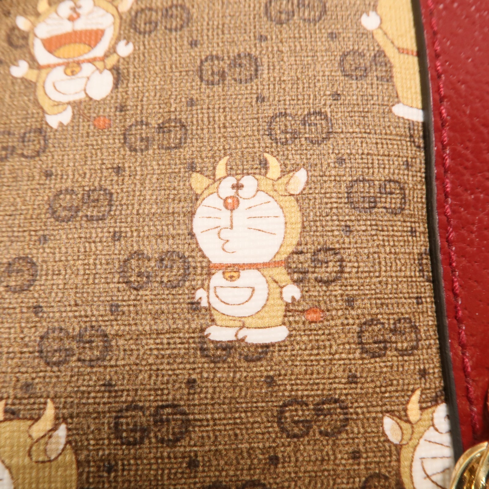 GUCCI 塗層帆布Doraemon Micro GG Supreme鏈帶手挽肩背兩用袋